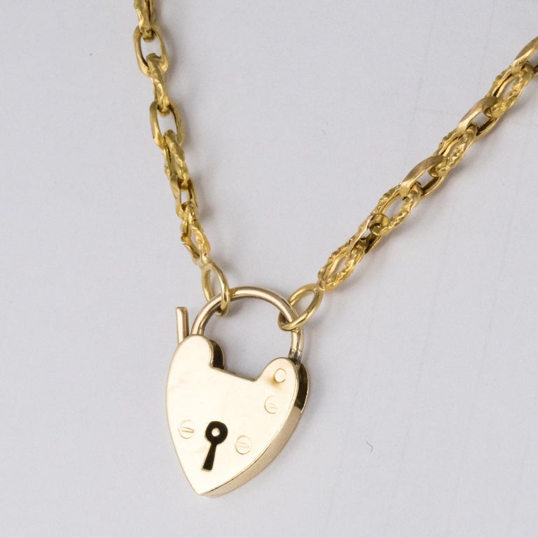 19th Century 18 Karat Yellow Gold Chiseled Chain HeartShaped Padlock