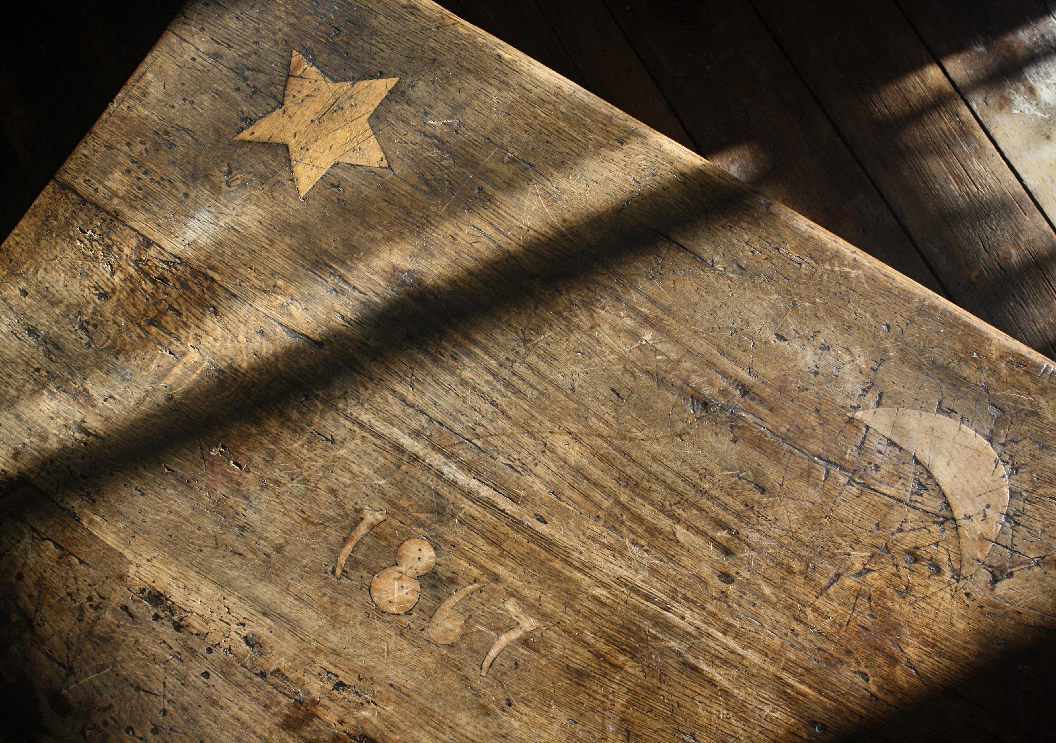 A rather wonderful shepherd pay table.

These tables where mainly used by the head shepherd in large country farmhouse, to take payments. There is a single deep drawer with a slopped front to make the withdrawal of the coins a easier task. 

The