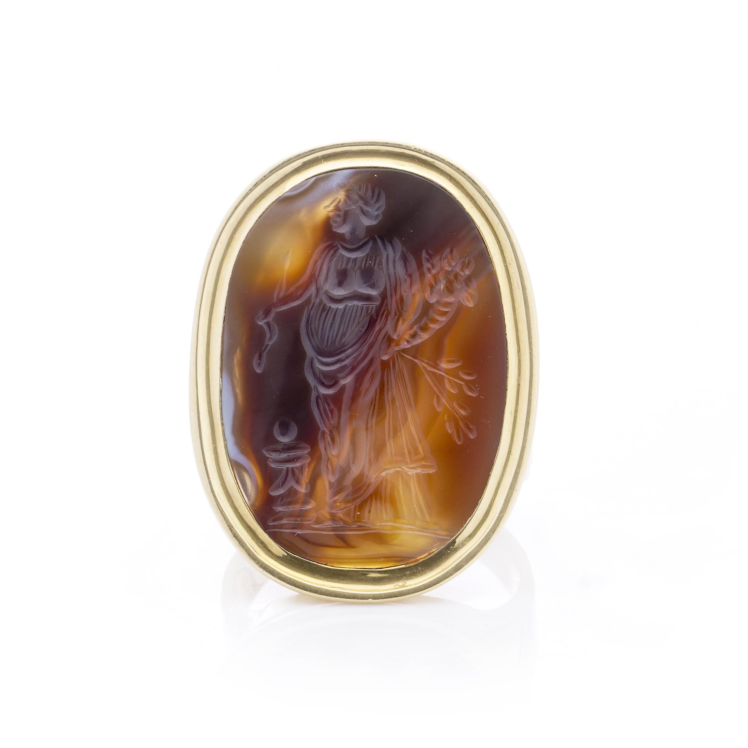 Antique 19th century 18kt. yellow gold banded agate intaglio signet ring featuring Ceres, a goddess of agriculture, grain and crops. 

Made in the late 19th century. 
X - X-ray has been tested for 18kt. gold. 

The dimensions - 
Ring Size: Length x