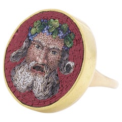 Antique 19th Century 18kt. yellow gold micro mosaic ring, featuring a Bacchus head