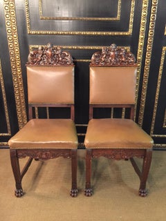two 19th Century antique Neo-Renaissance Oak Chairs hand carved