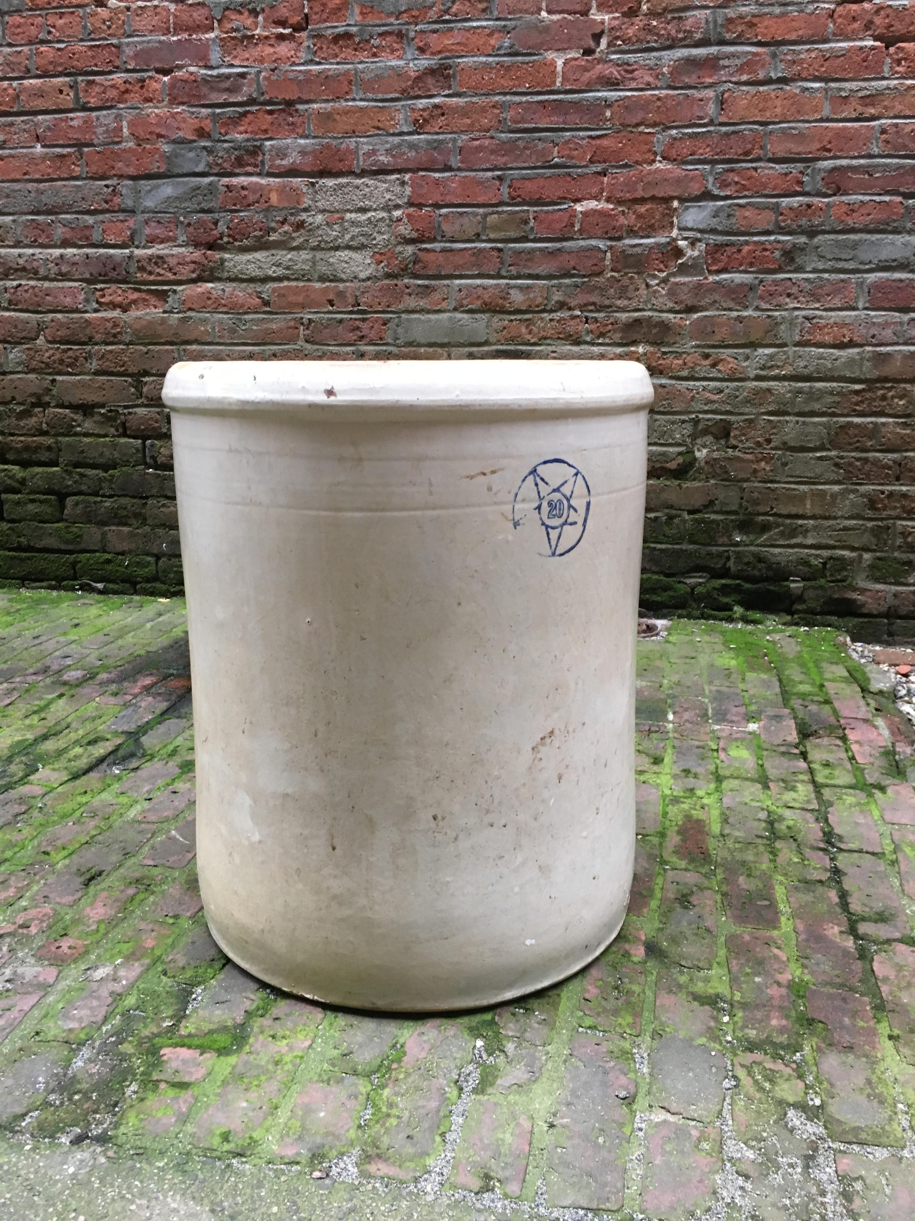 Heavy weight 19th century American stoneware crock. Massive glazed exterior and unglazed interior. Good condition; no visible cracks, hairlines, dings or restorations. There are some manufacturing base chips. Cobalt painted number in