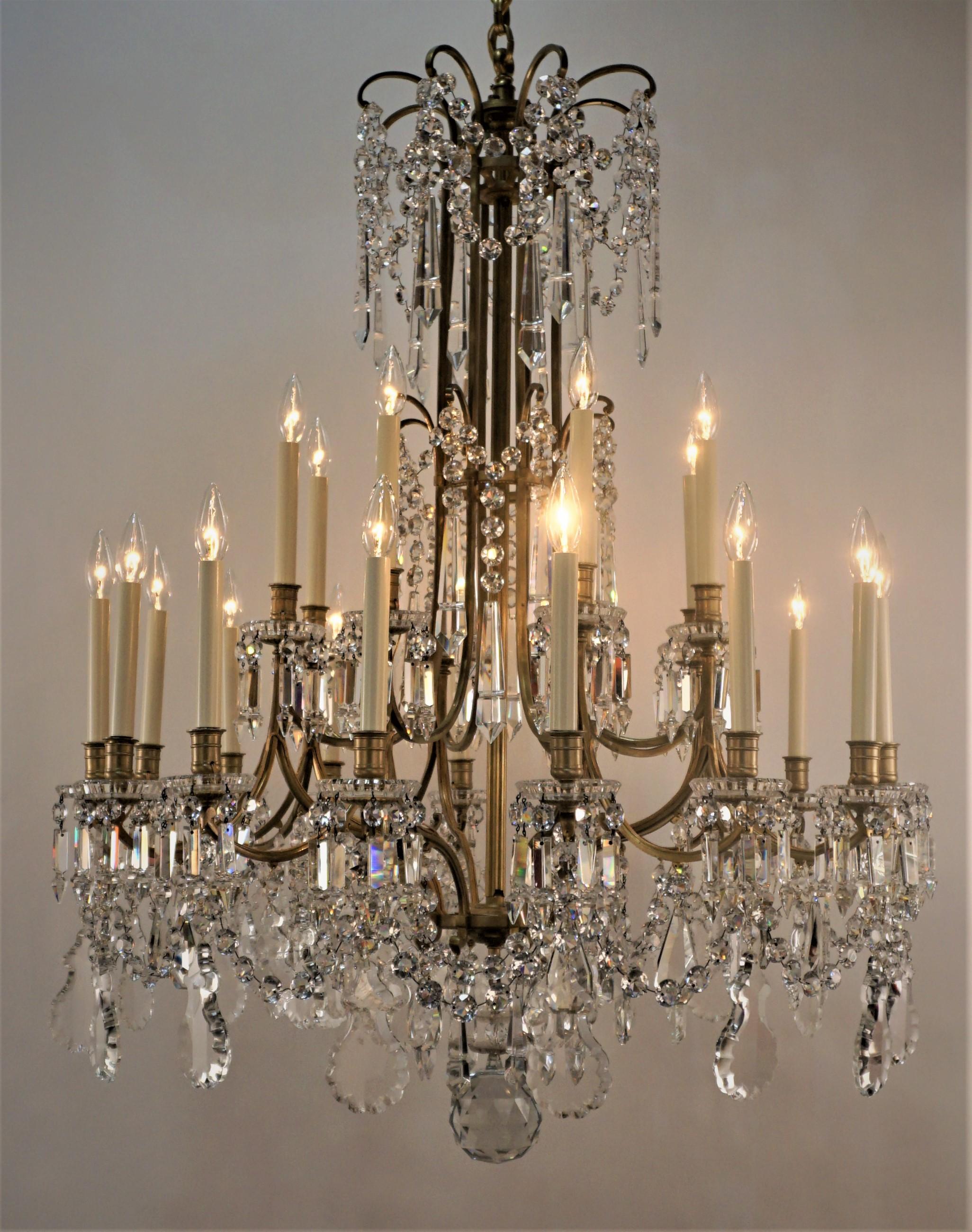 A rare and large 19th century 24 chandelier with beautiful bronze frame decorated with beautiful hand polished sparkling crystals. This exquisite, marked Baccarat crystal chandelier is example of superiority of 19th-century lighting
This chandelier