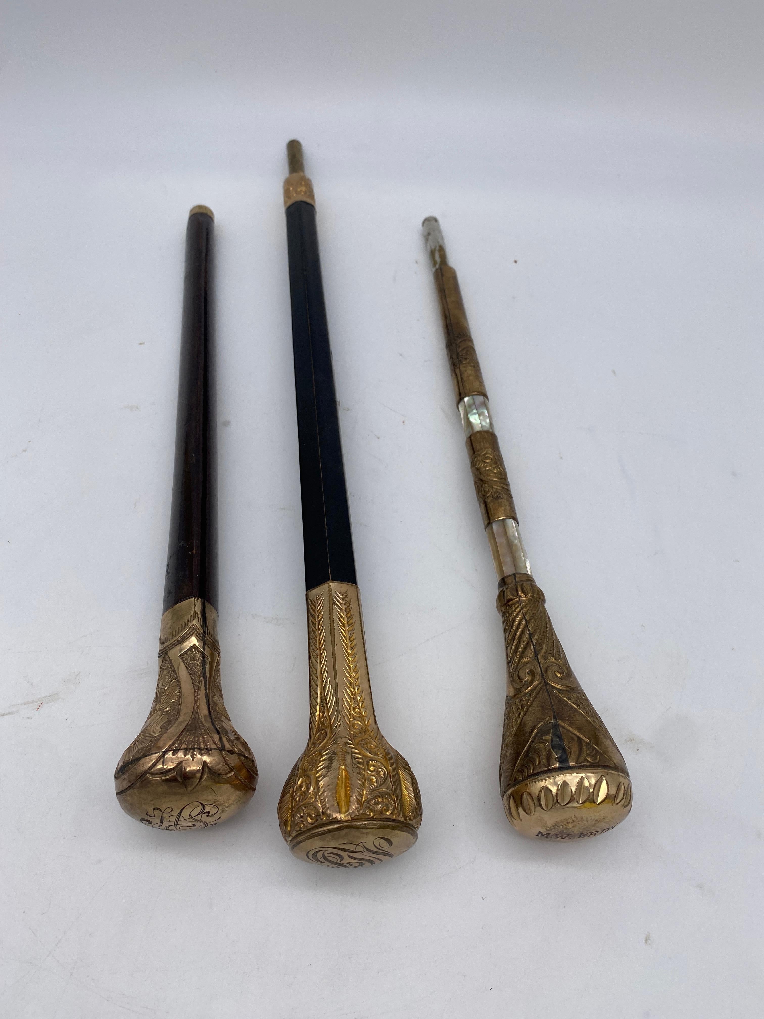 19th century 3 antique Victorian gold topped canes or parasol handles, some monogrammed, one with mother of pearl, see more pictures.