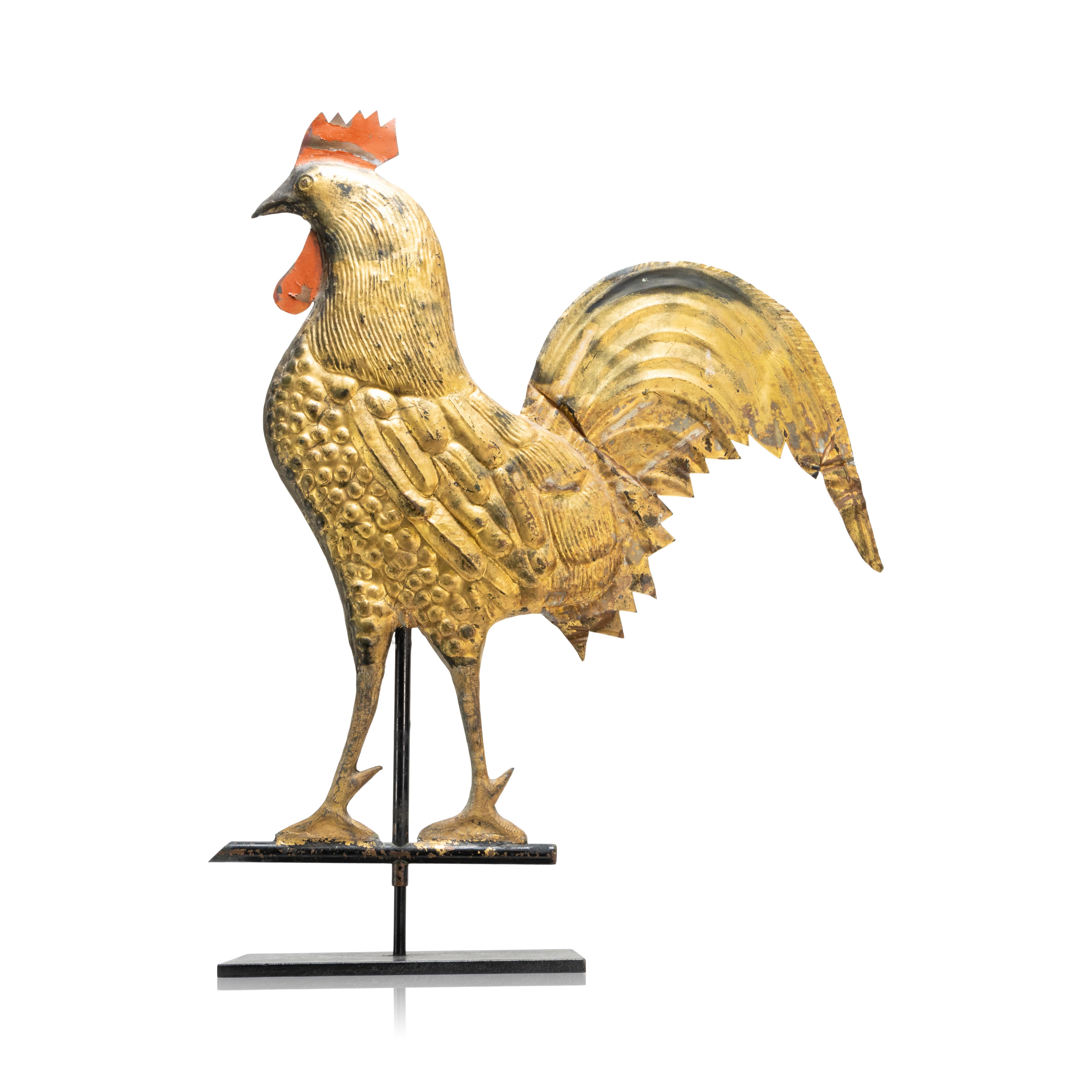 19th Century American full bodied copper rooster weather vane with gilded and red overpaint and cast zinc feet. Some weathering in areas of later black overpaint. 26