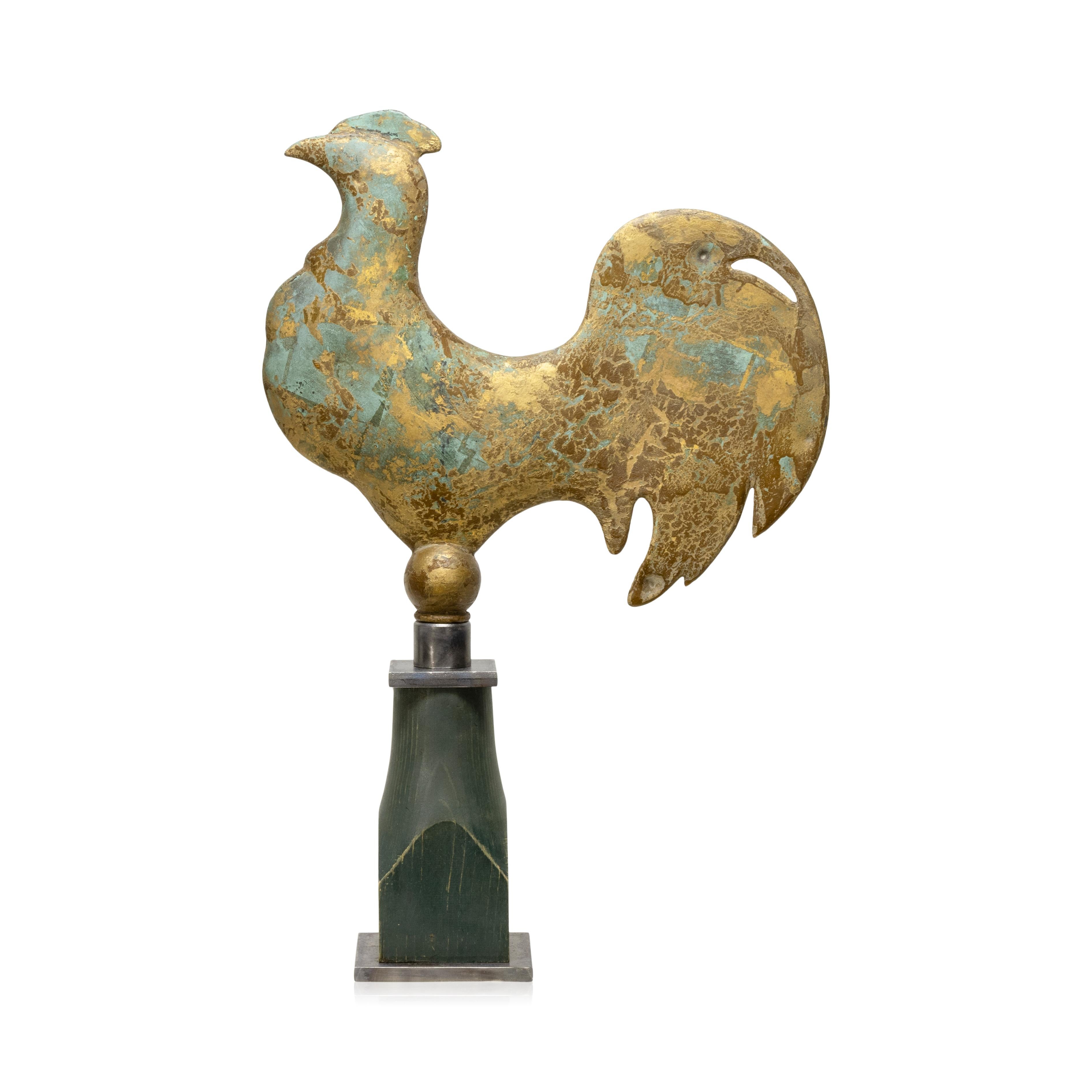 19th Century American cast copper full bodied rooster weather vane attributed to Vermont. Green verdigris, patination, traces of old paint and some gilt. This weather vane originally sat atop a building in Vergennes, Vermont. Ex. American Folk Art