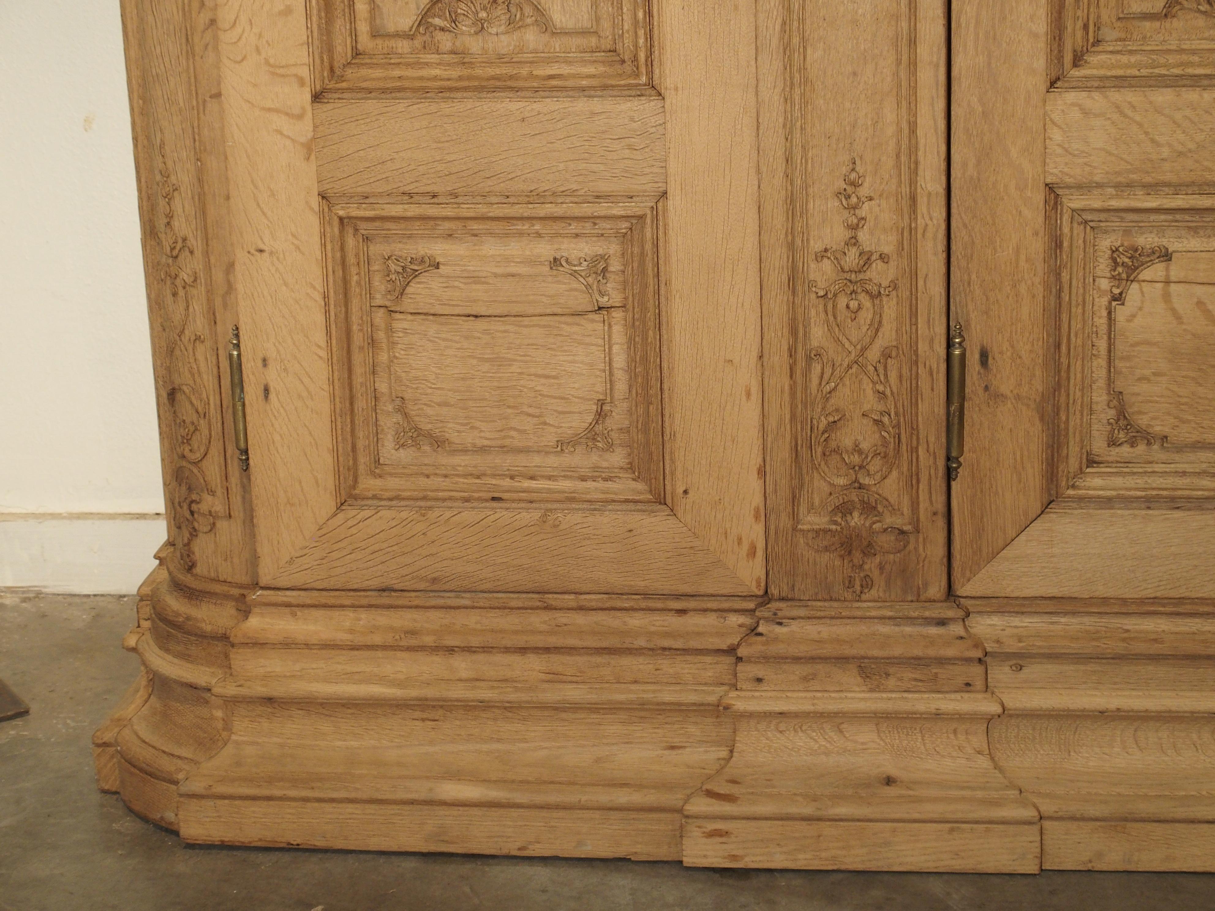 Hand-Carved 19th Century 3-Door French Oak Sacristy Cabinet in the Regence Style
