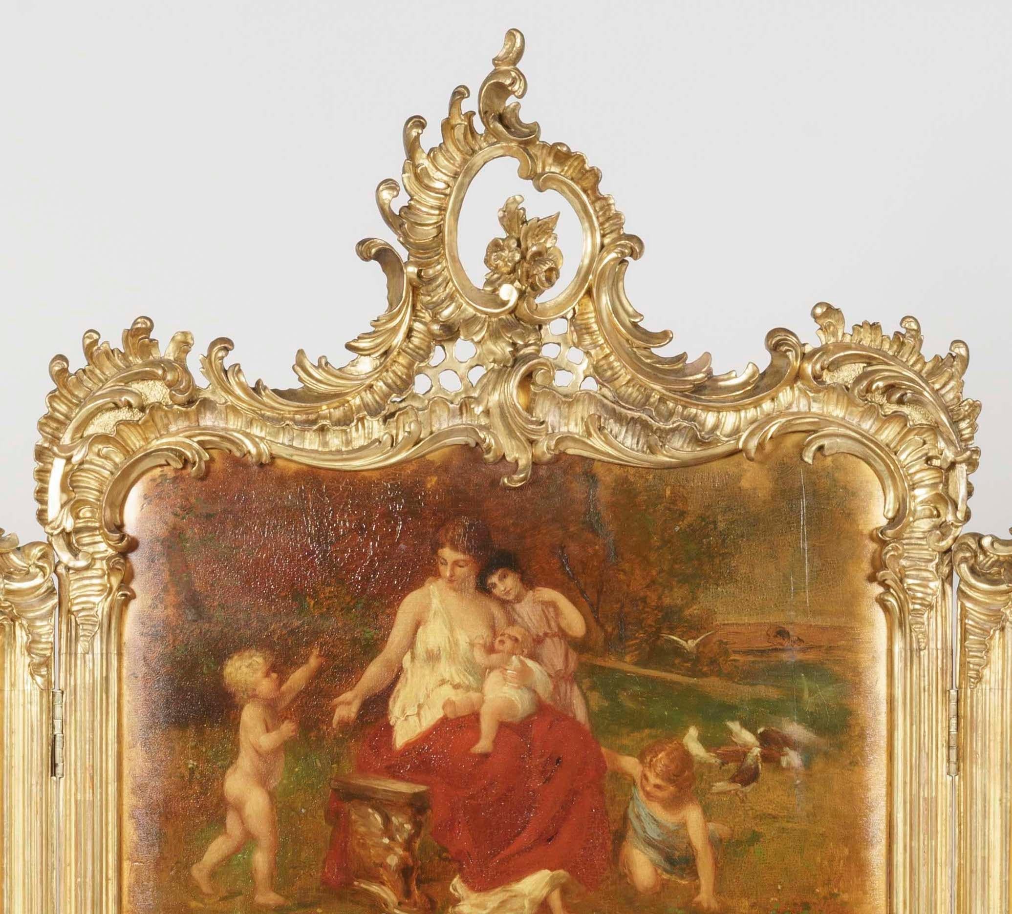 A three-fold Vernis Martin screen
In the Louis XV Manner

The frame constructed from carved and gilded wood in the Rococo manner, the triptych Vernis Martin panels depicting idyllic painted scenes of classical maidens and children in the style of