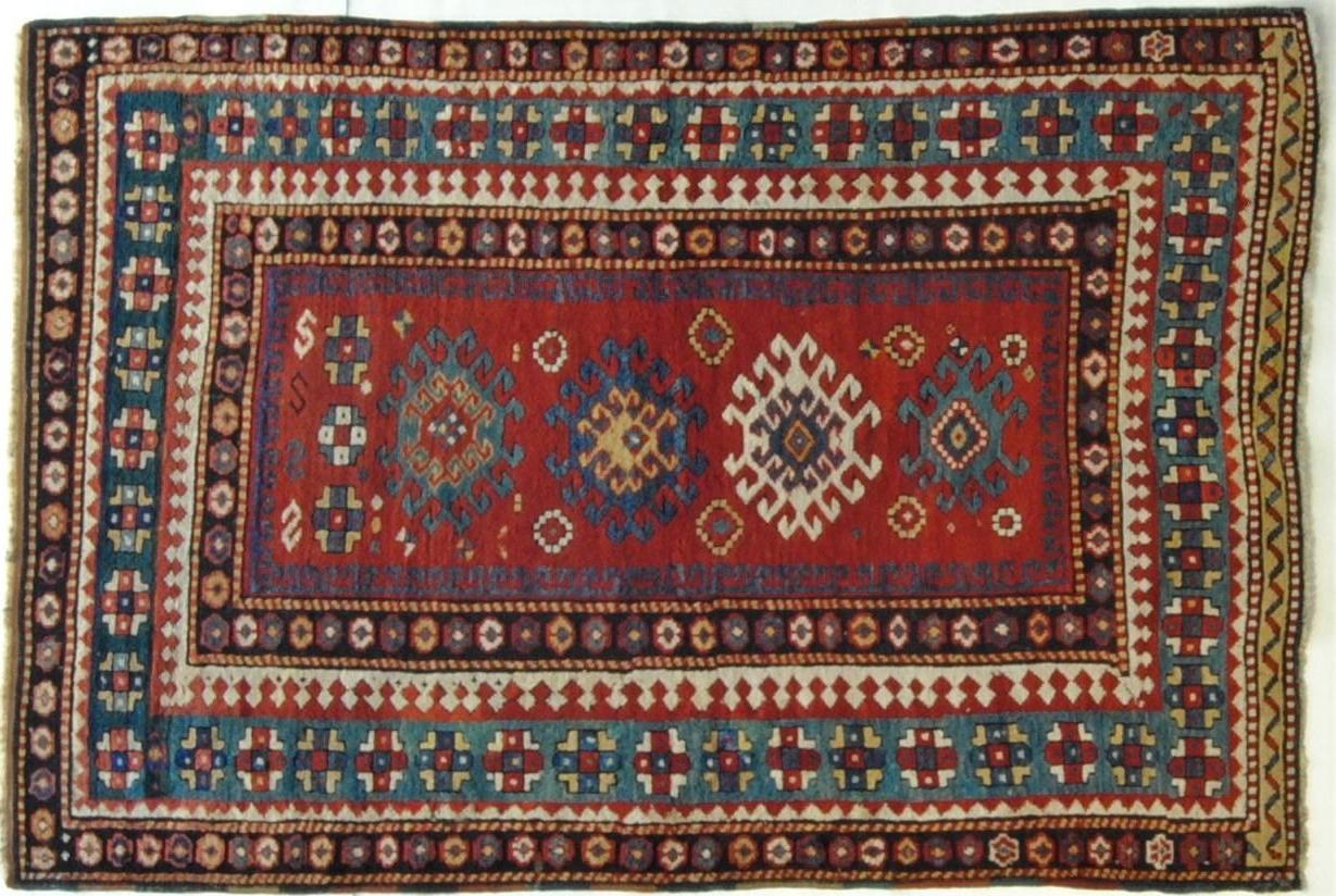 These carpets are knotted by the Borciali Cossacks in the village of Bordjalu, south of Tiflis. They are distinguished by designs that are predominantly geometrical, such as aligned-pointed lozenges, hooked hexagons inscribed in each other and