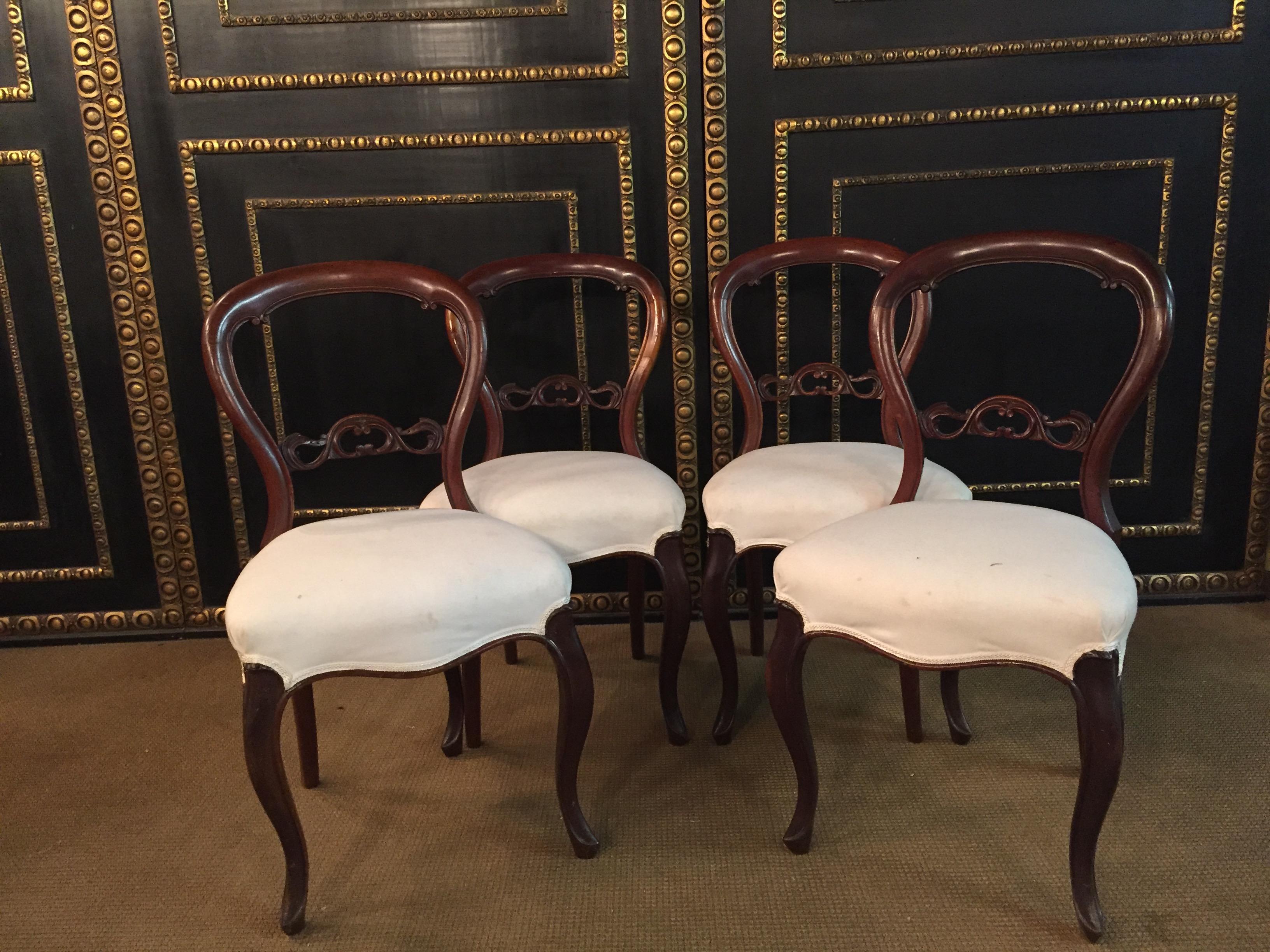 4 original Biedermeier Chairs around 1830,
backrest medallion massive mahogany.
  
  