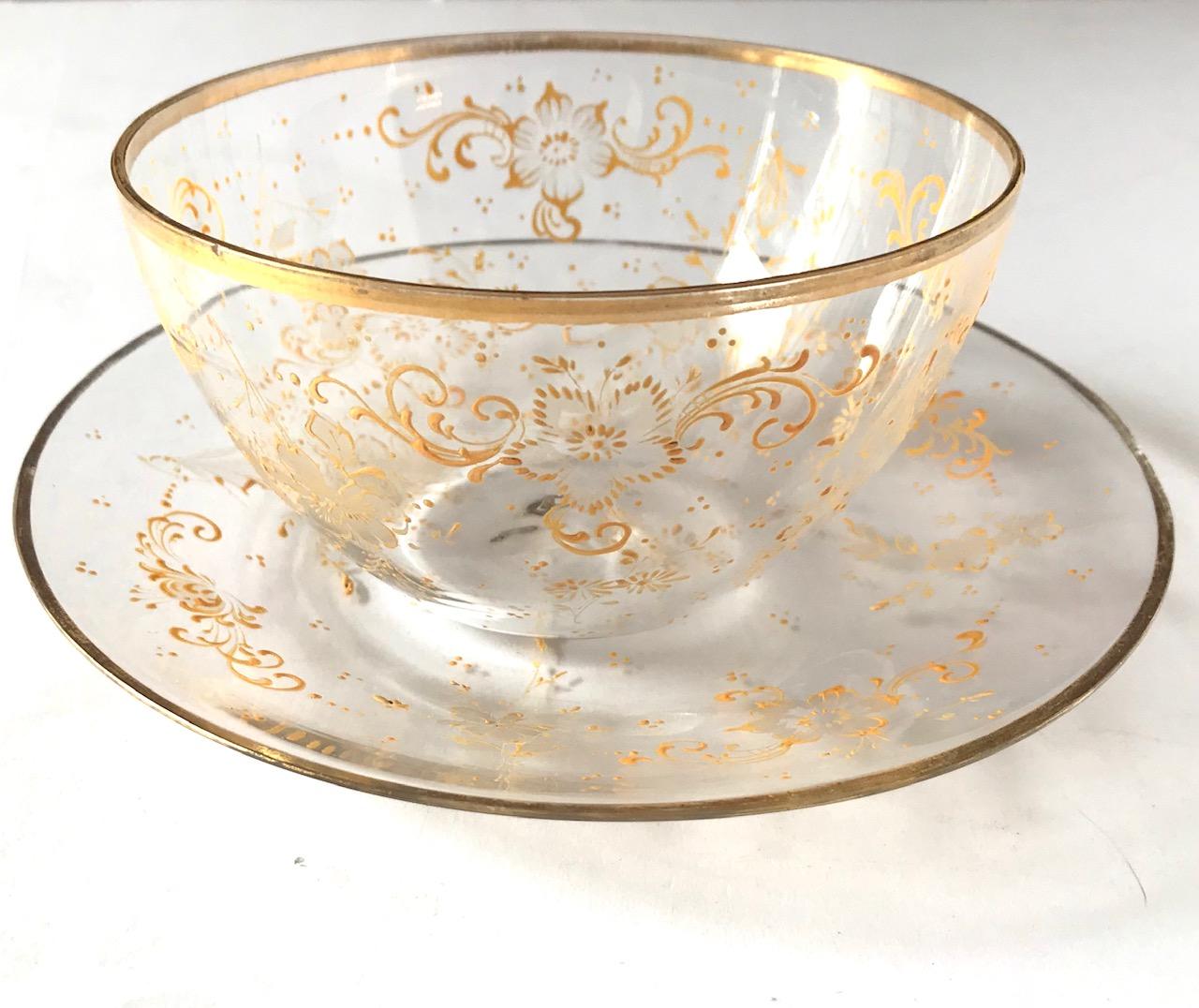 These bowls are made in the late 19th century by J & L Lobmeyr of Vienna, Austria. They are embellished with elegant, delicate Rococo style relief enameled ornaments and gold rimmed. The design is a beautiful scrolling floral motive. Although the