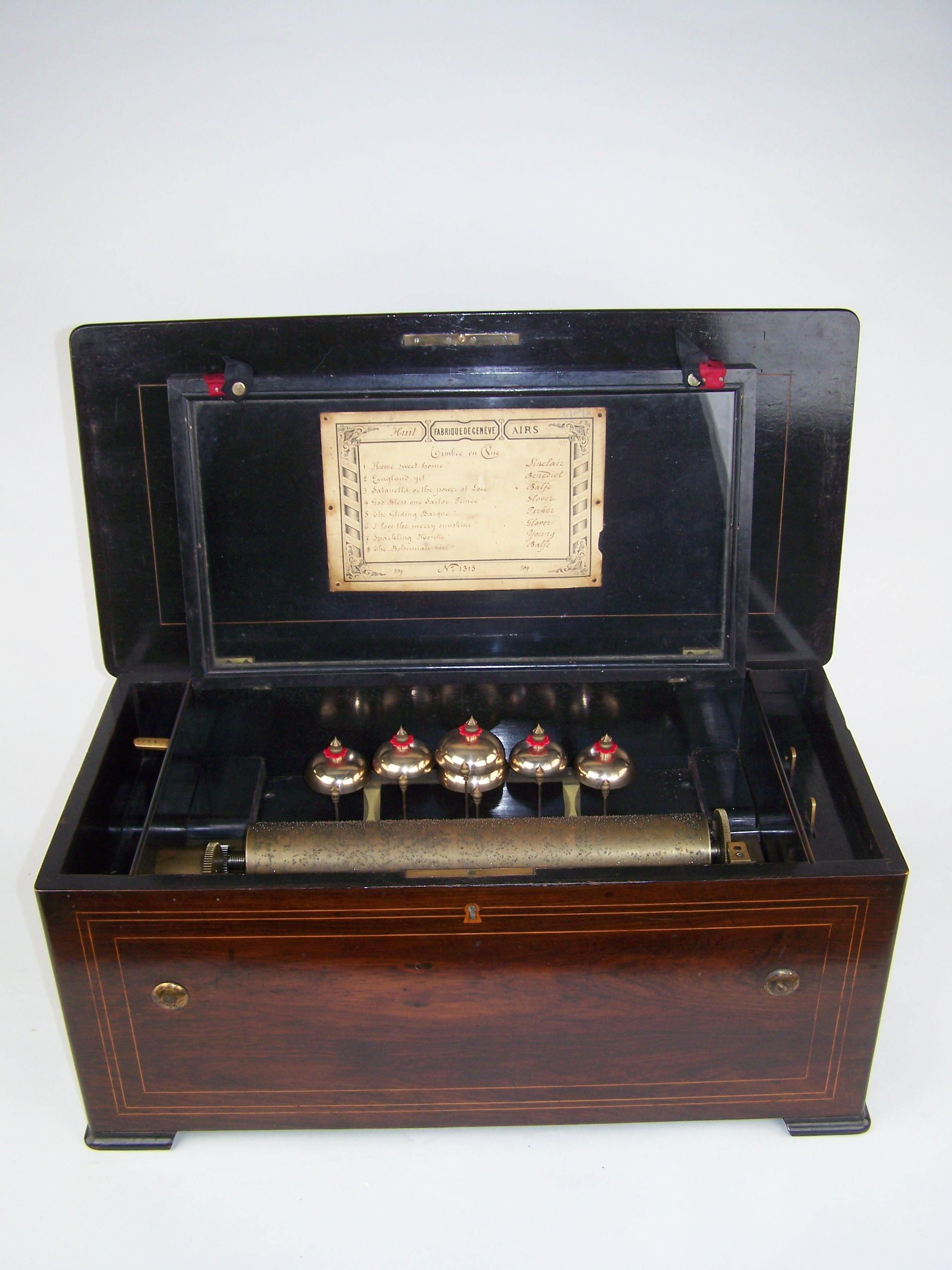 19th century 8 tune music box with 6 bells 3