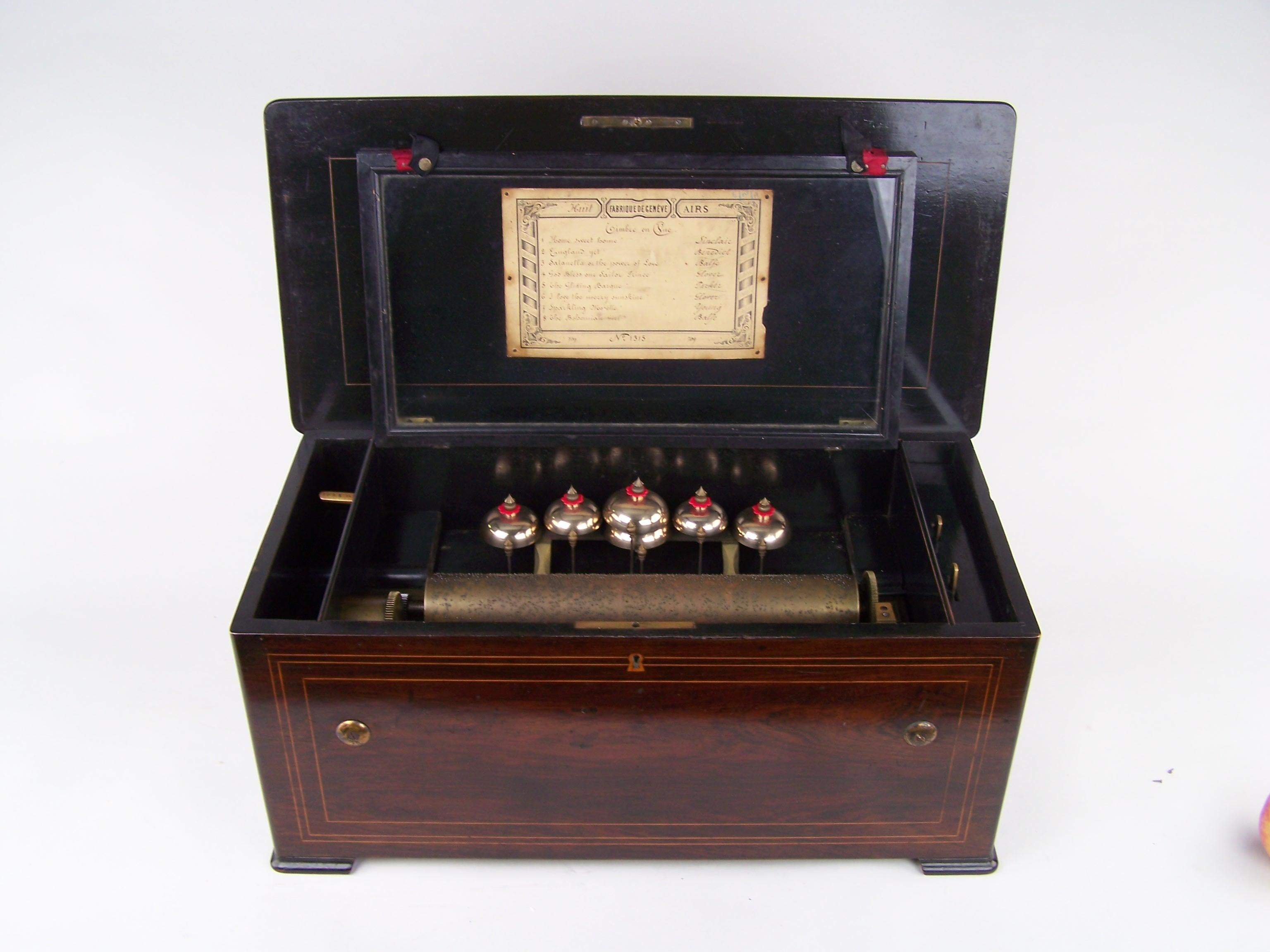 19th century 8 tune music box with 6 bells 4