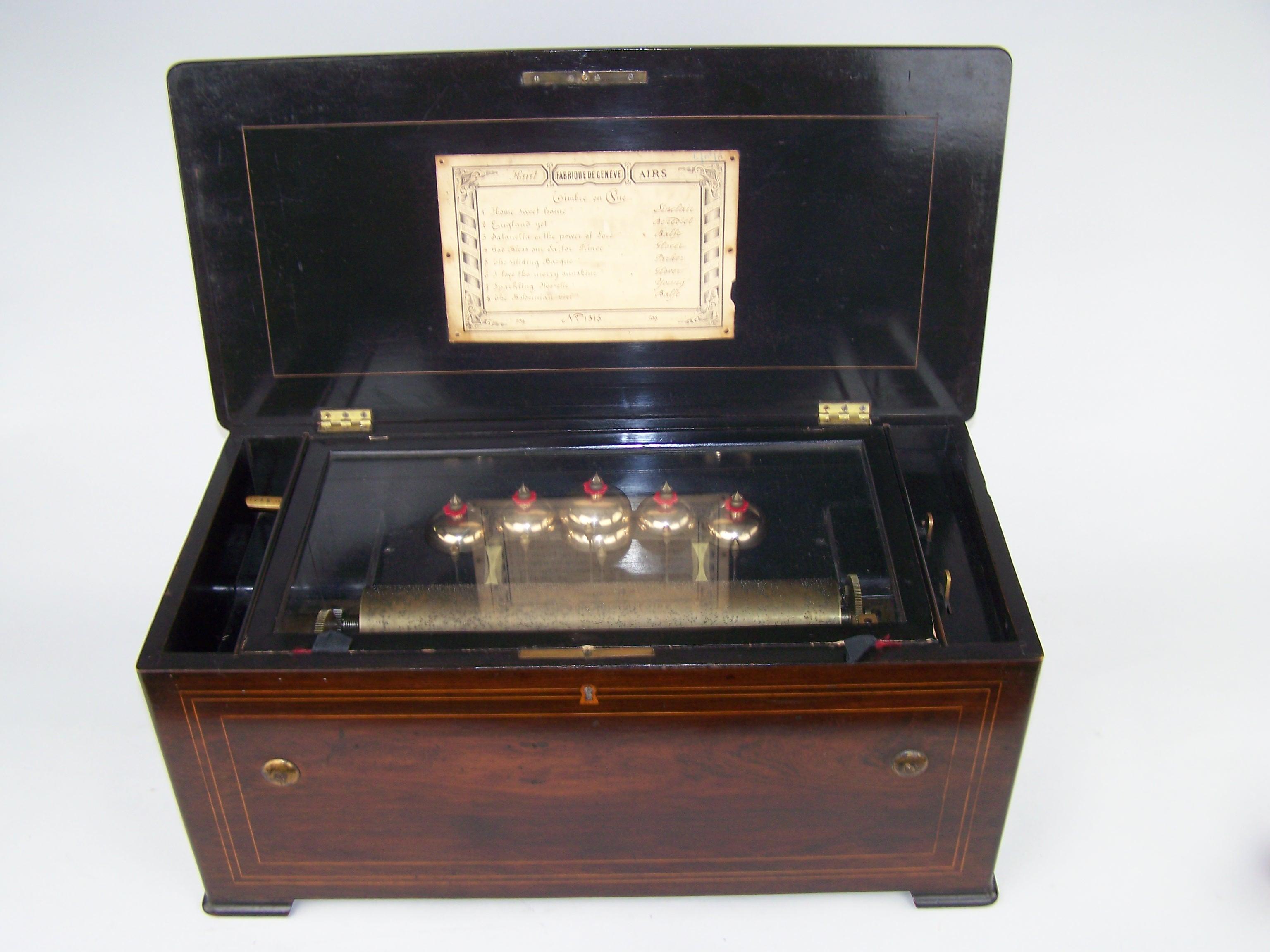 Ebonized 19th century 8 tune music box with 6 bells