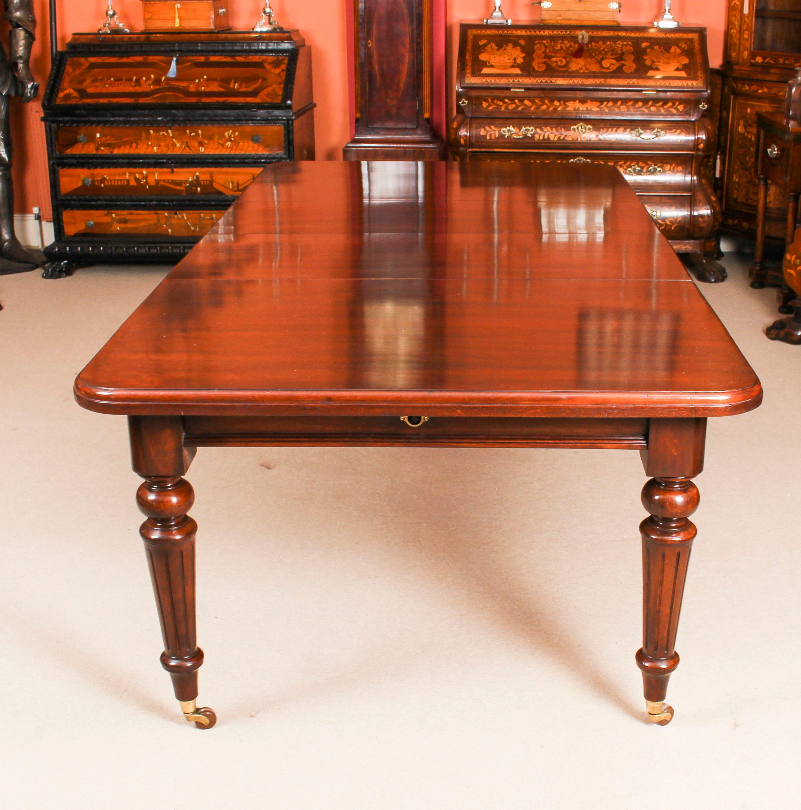 This is a magnificent antique Victorian solid mahogany wind out dining table which can seat ten diners in comfort and circa 1870 in date.
 
This beautiful table is in stunning mahogany and has two leaves of forty five cm each, which can be added