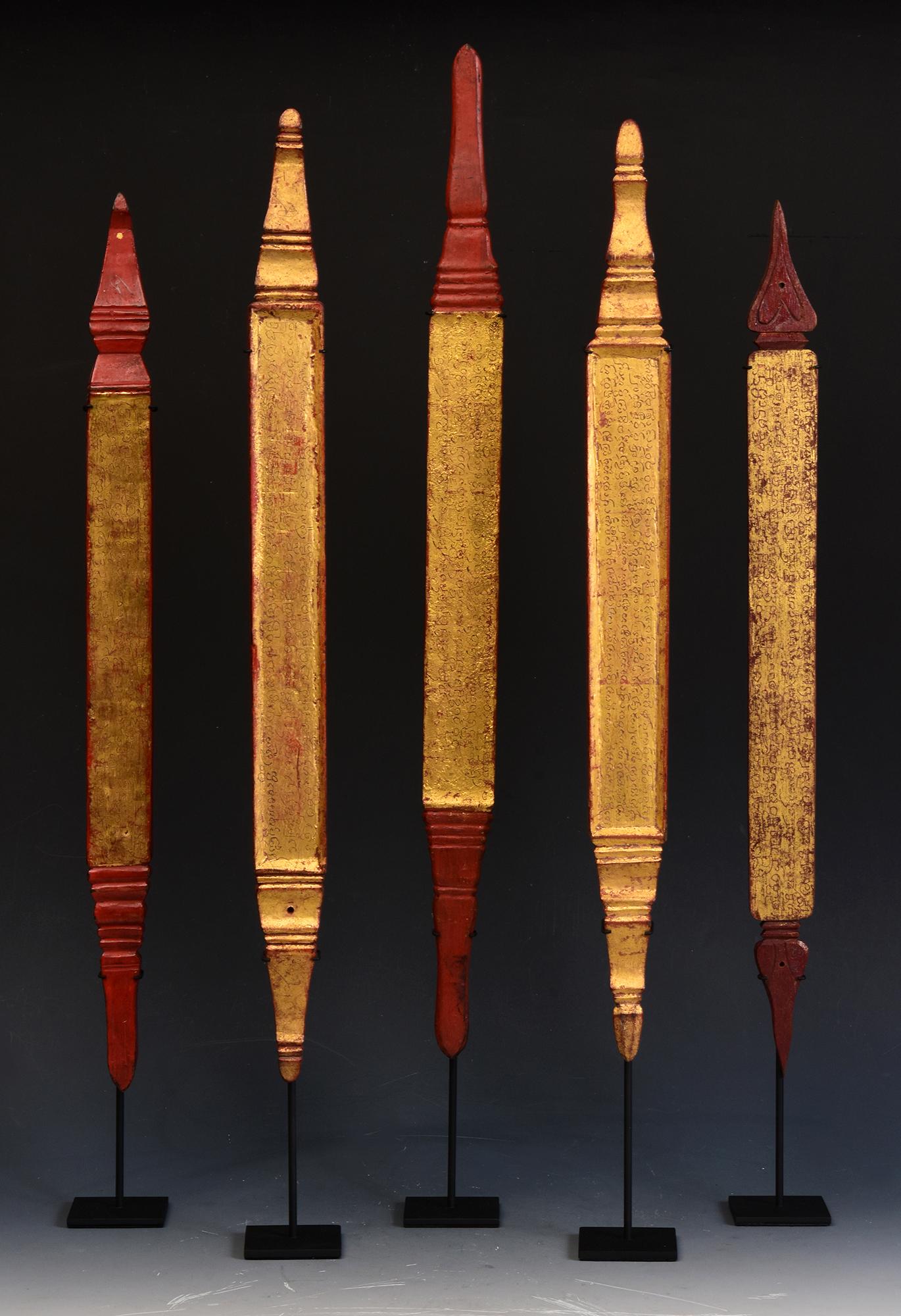 A set of antique Lanna Thai wooden manuscript bookmark with stand.

Age: Thailand, 19th Century
Size of bookmark only: Length 46.5 - 53.4 C.M. / Width 3.6 - 4.1 C.M. / Thickness 1.4 C.M.
Height including stand: 54.3 - 62 C.M.
Condition: Nice