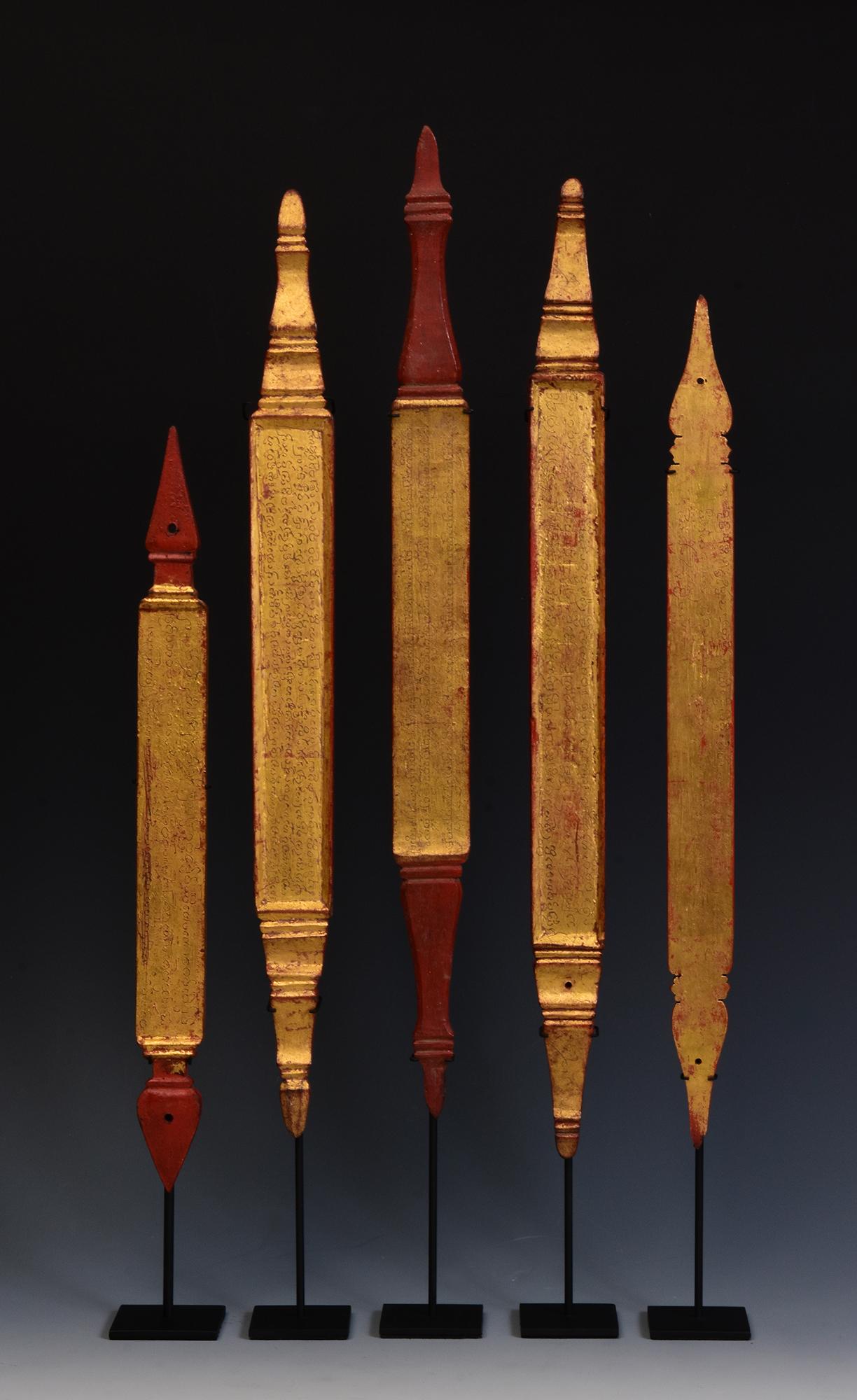 A set of antique Lanna Thai wooden manuscript bookmark with stand.

Age: Thailand, 19th Century
Size of bookmark only: Length 39.1 - 49.9 C.M. / Width 3.5 - 4 C.M. / Thickness 1 C.M.
Height including stand: 46.3 - 60.9 C.M.
Condition: Nice condition