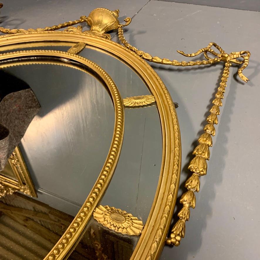 19th Century Adams Style Oval Gilt Mirror with Tied Ribbons and Urn Decor In Good Condition In Uppingham, Rutland