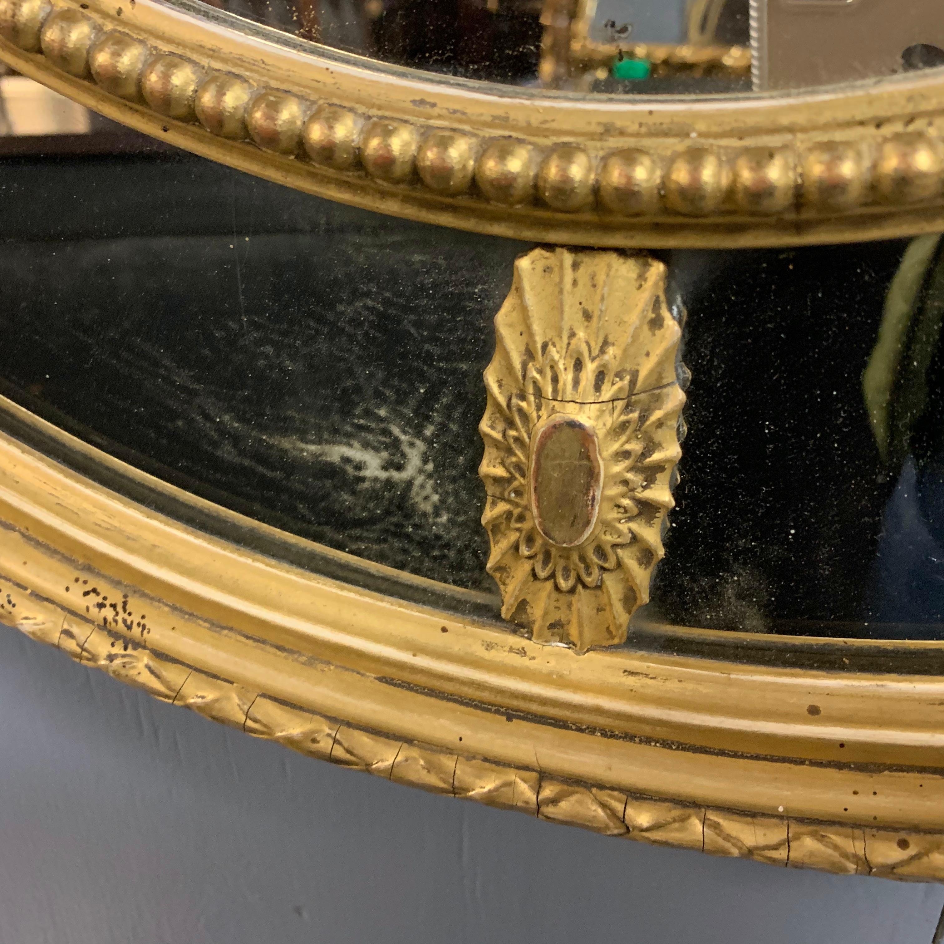 Pine 19th Century Adams Style Oval Gilt Mirror with Tied Ribbons and Urn Decor