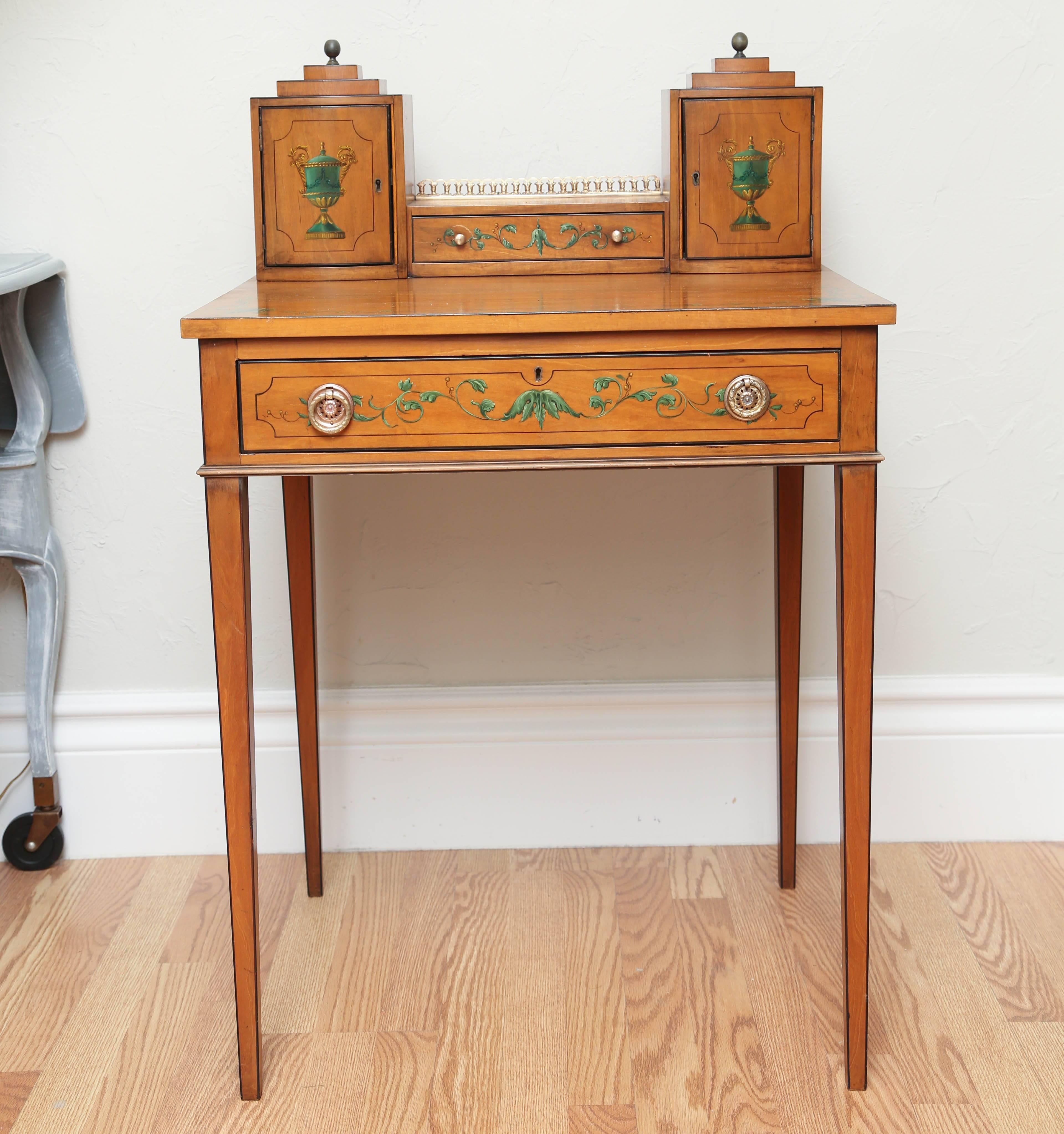 Most charming antique Bonheur Adams style desk with beautiful painted accents and architectural detail.