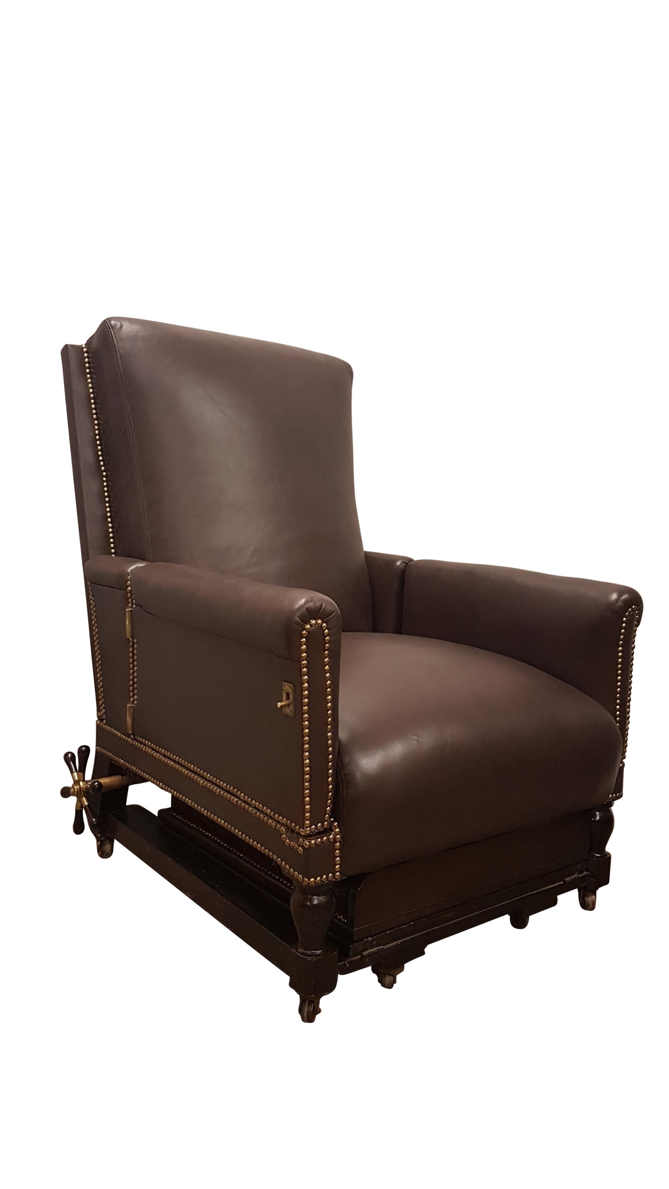 This is a large grand 19th century fully adjustable armchair that has been fully reupholstered in Connolly leather. Connolly leather supply amongst others Aston Martin. The back on the chair reclines with the use of a very unique winding mechanism