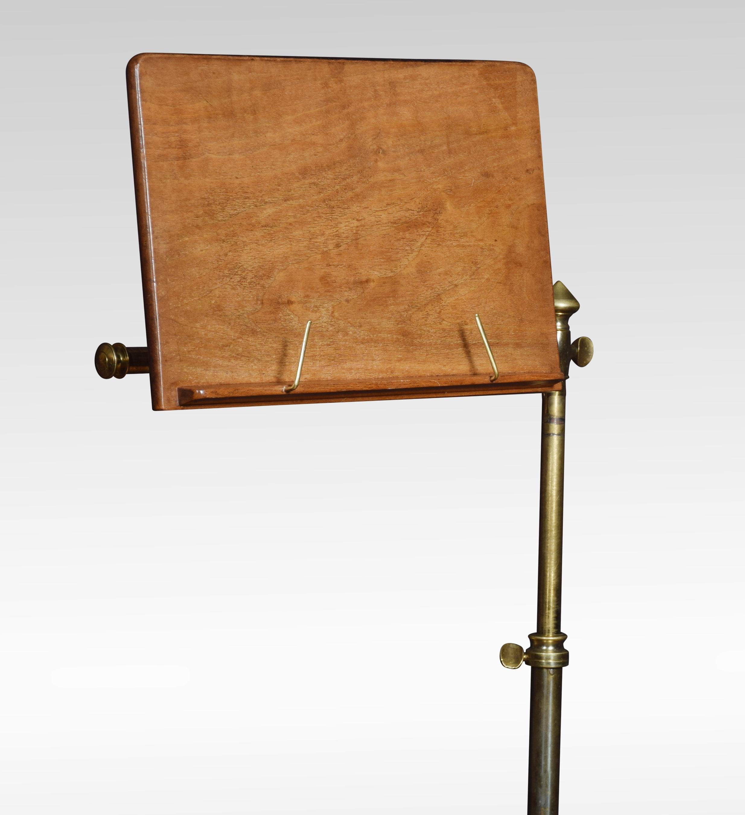 19th century music stand the mahogany sheet music holder on telescopic brass support. Raised up on four cast-iron paw feet.
Dimensions:
Height 43.5 inches adjustable
Width 17.5 inches
Depth 17.5 inches.