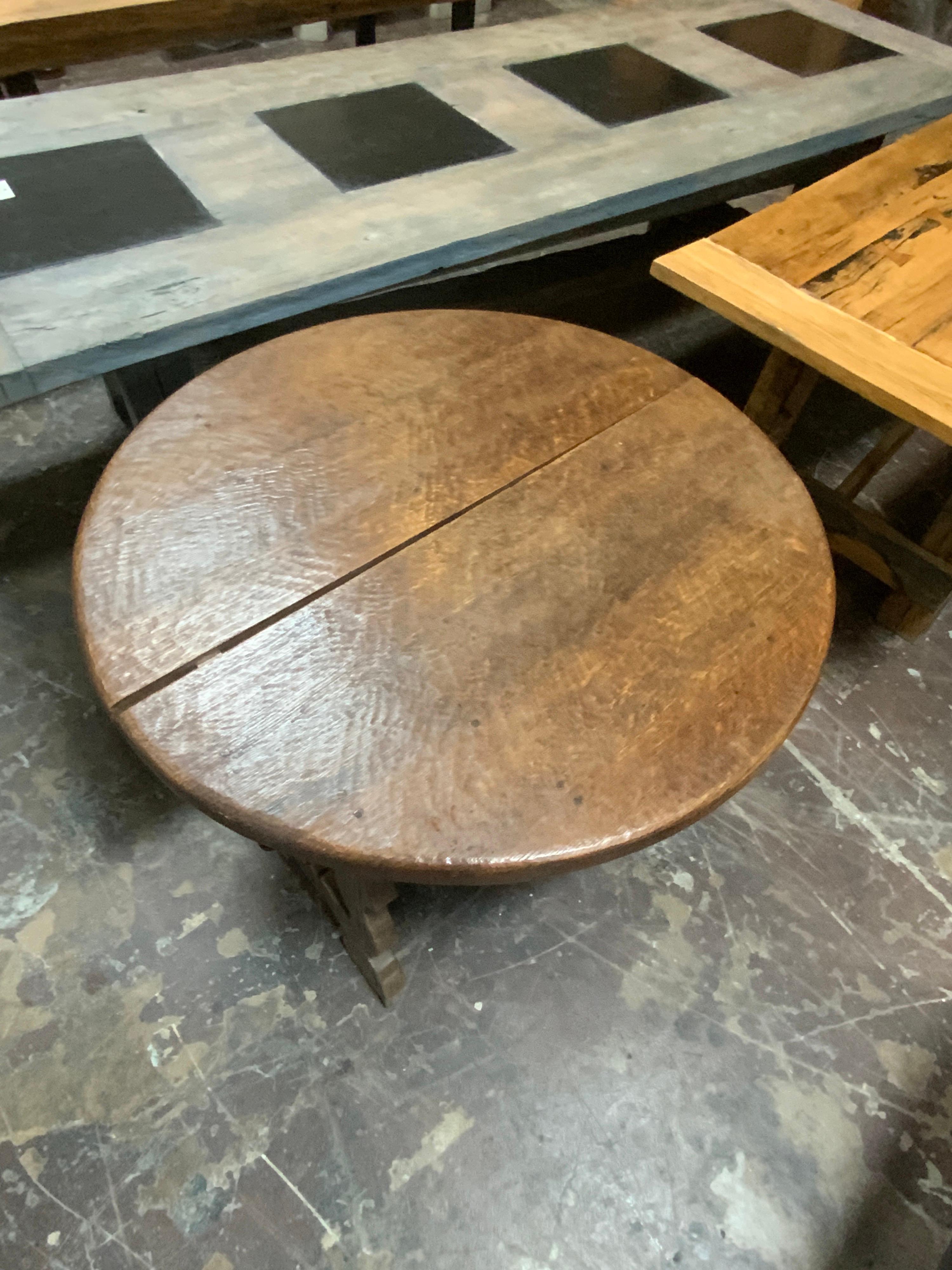 Beautifully made adjustable breakfast table composed of antique oak wood. Table features rectangle insert that lengthens table. Origin France.