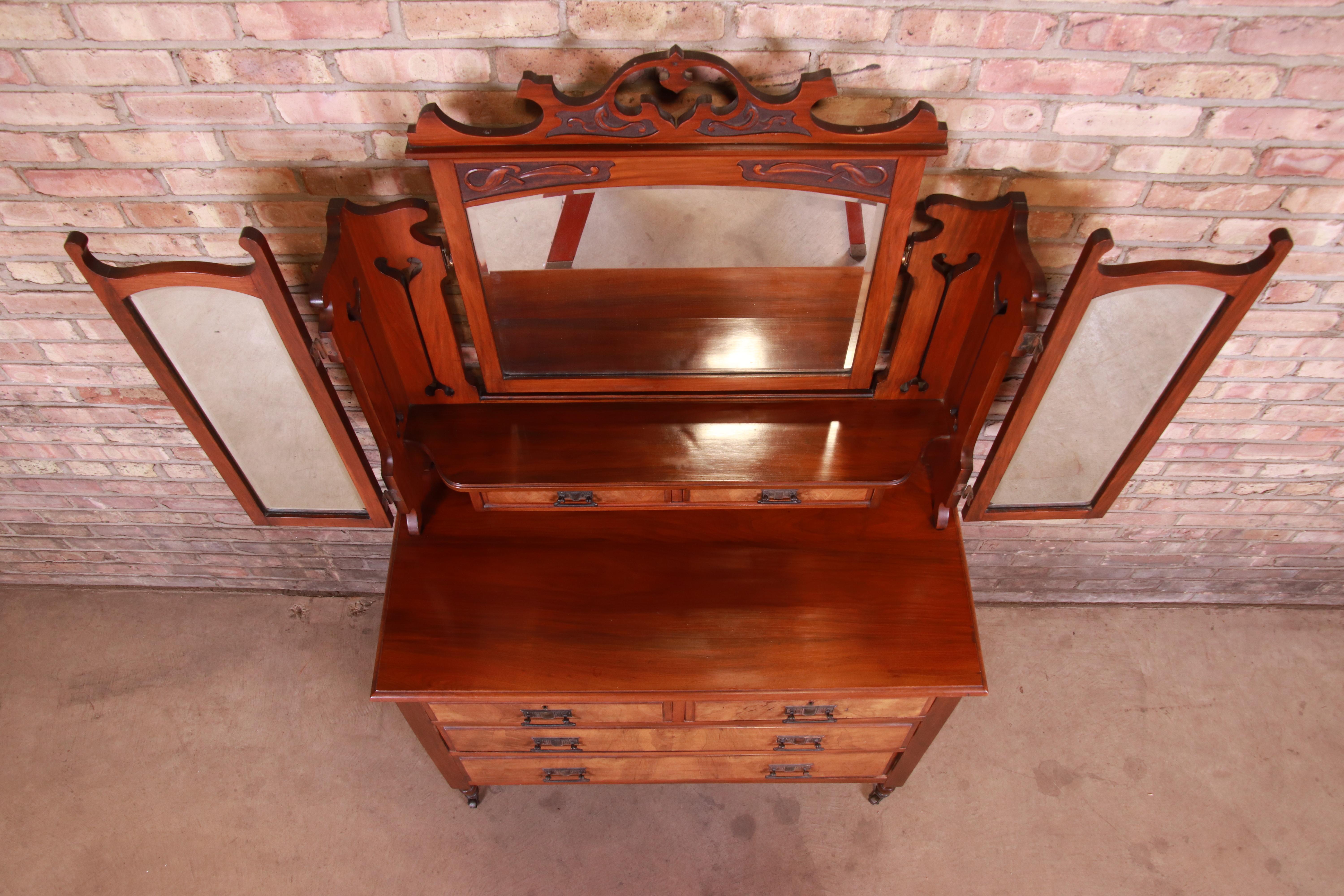 American 19th Century Aesthetic Movement Walnut and Burl Dresser with Triple Mirror