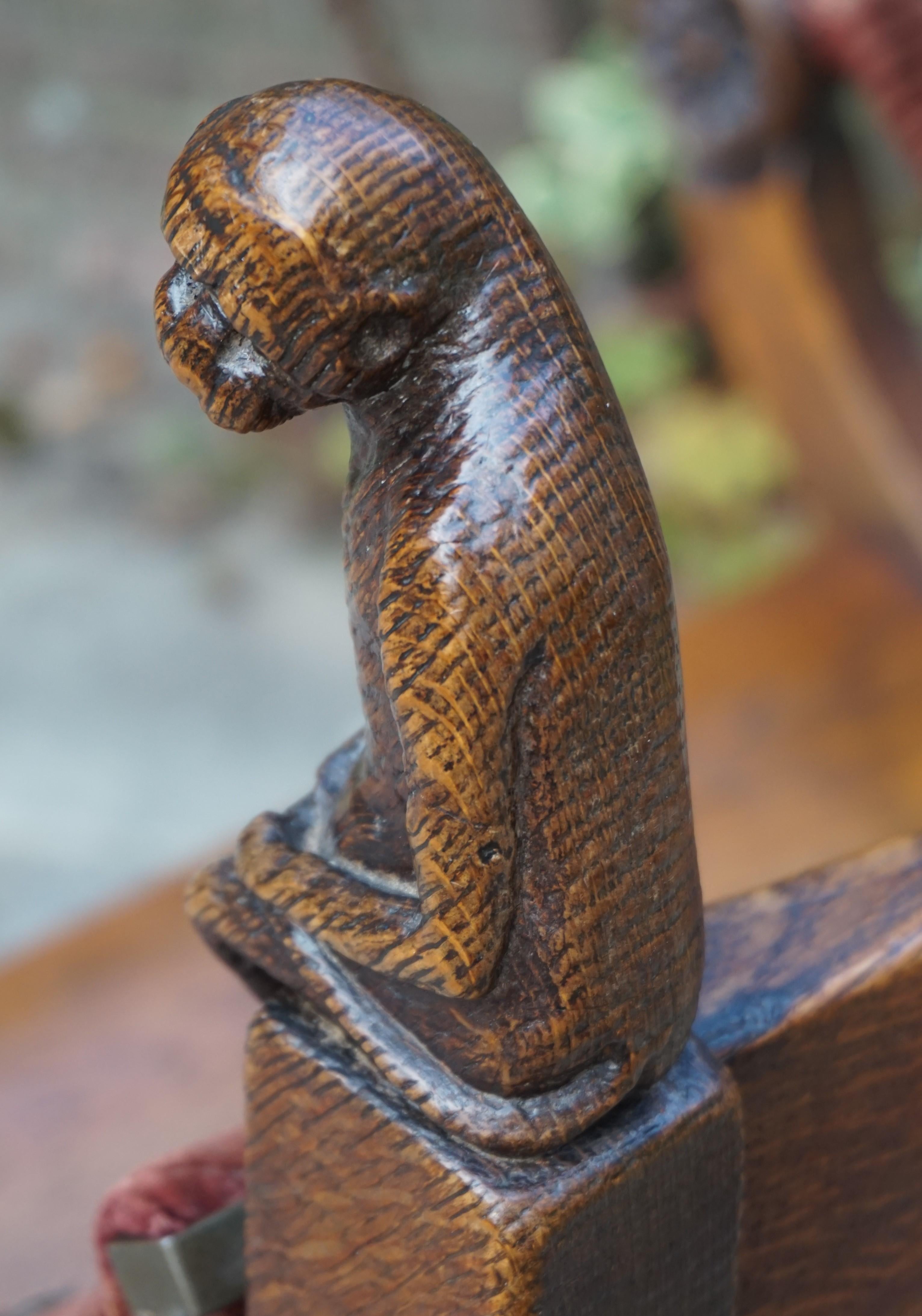 Hand-Carved 19th Century Aesthetic Movement X-Frame Chair w. Hand Carved Monkey Finials For Sale