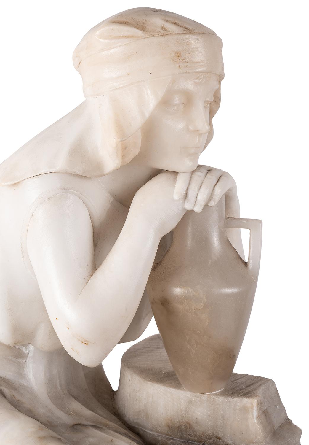 lady with water jug statue
