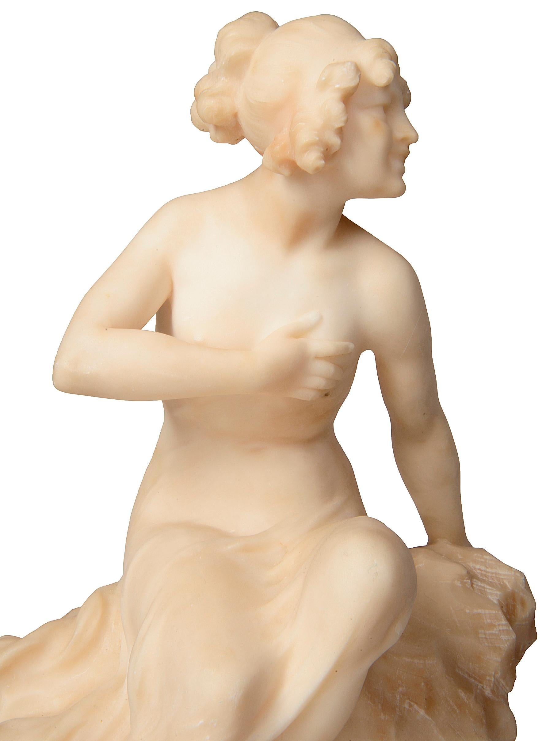 Italian 19th Century Alabaster Statue of a Young Girl Sitting on a Rock For Sale