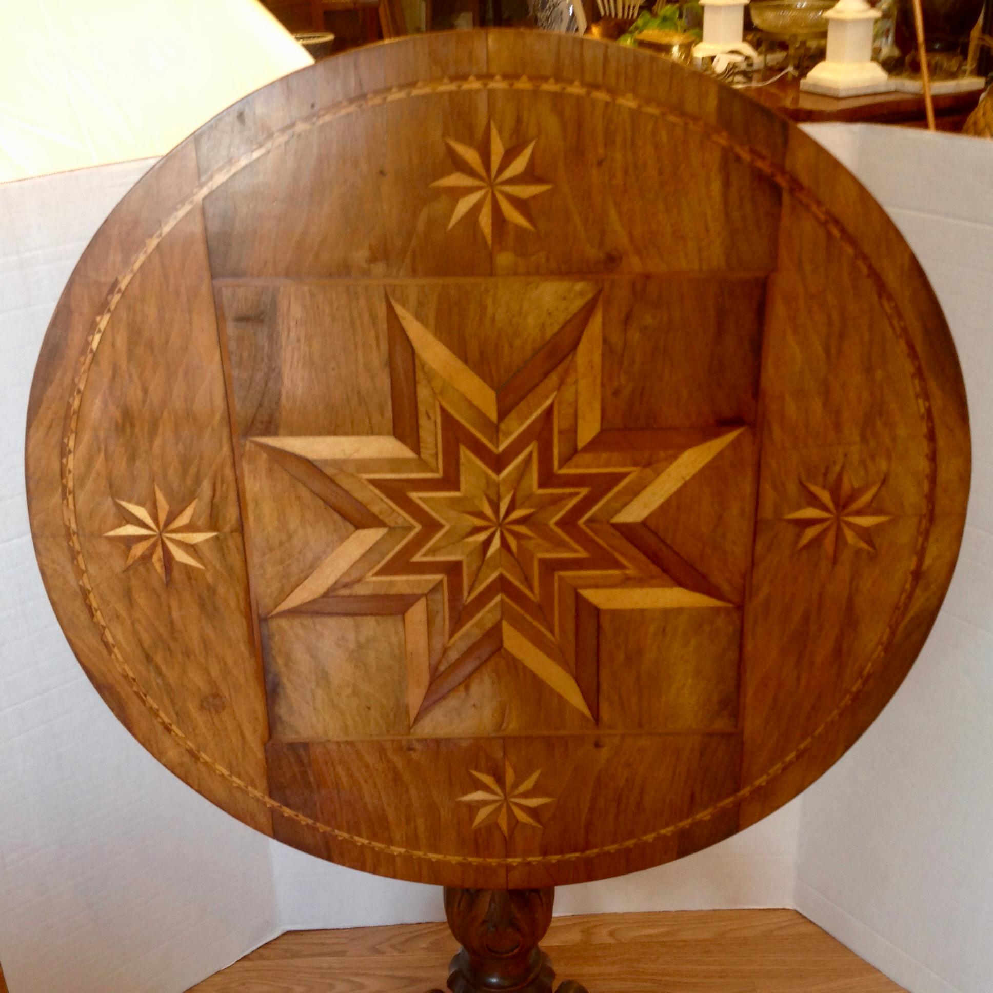 Carved 19th Century Alpine Inlaid Tilt Top Table For Sale