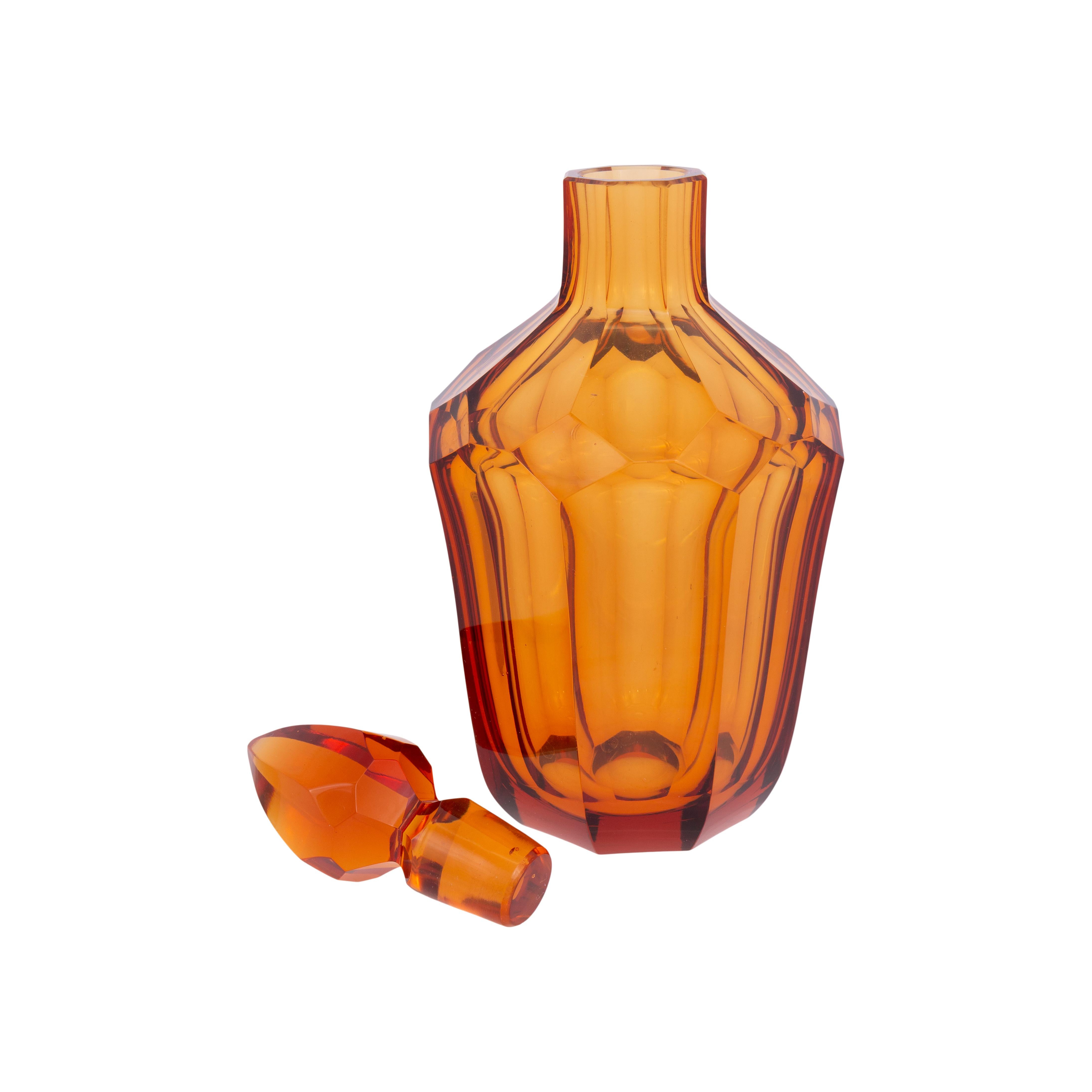 Stunning amber fluted back bar bottle with spear tip.

Period: Last quarter 19th century
Origin: United States
Size: 4