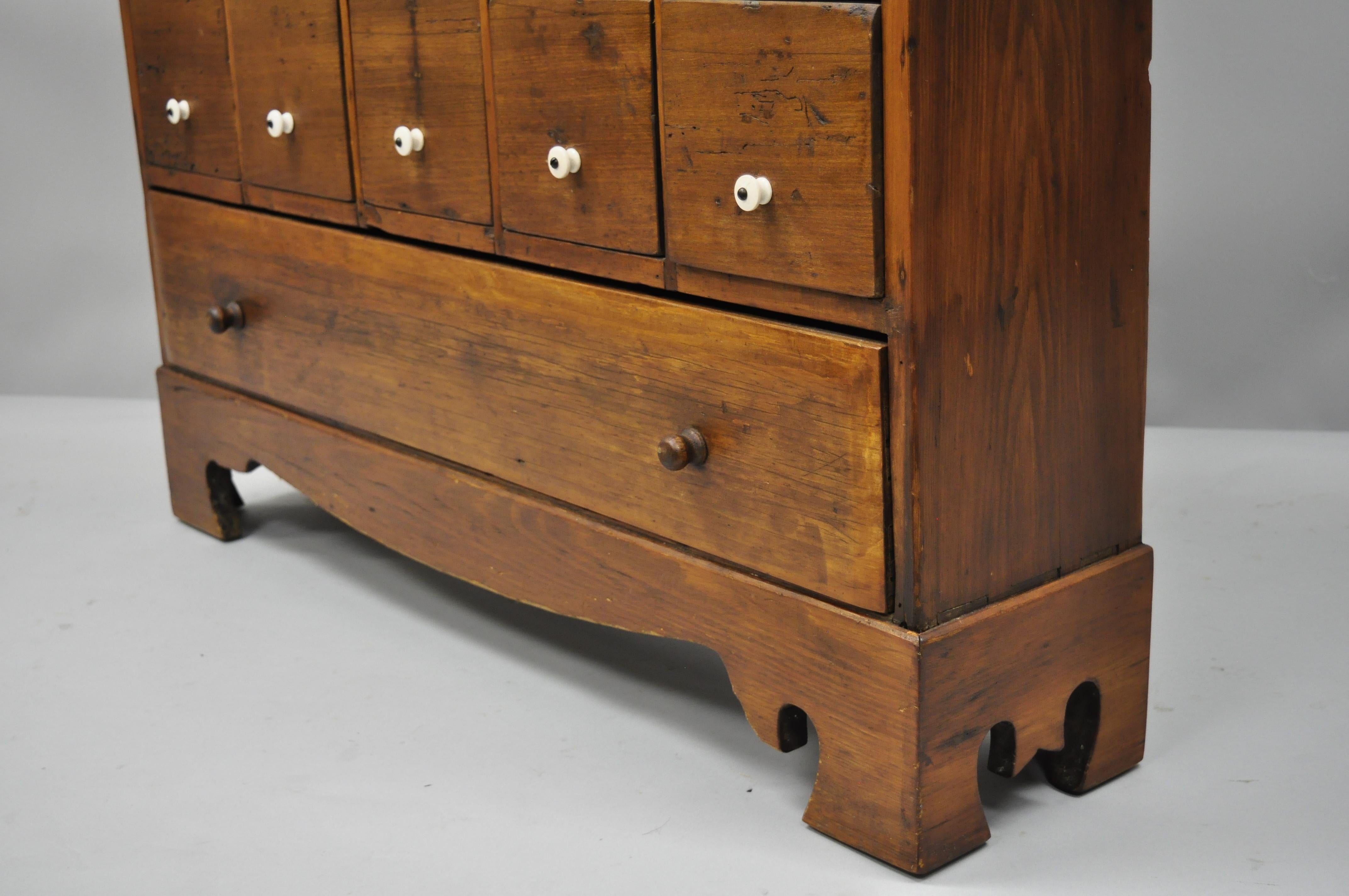 19th Century American 26 Drawer Dovetailed Pine Wood Apothecary Cabinet Chest In Good Condition In Philadelphia, PA