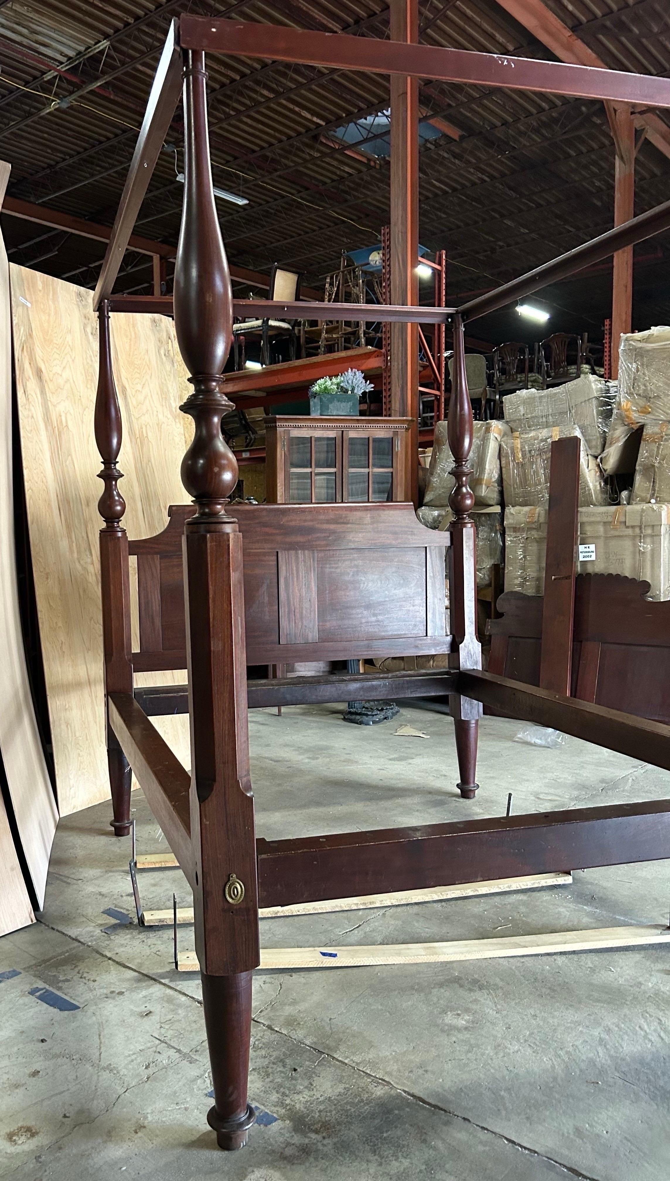 19th Century American 4 Post Mahogany Bed. Currently a full size, we can convert this bed in our workshop to a queen or king size in just a few weeks for an additional $1800. When we make our conversions, they are fully reversible- the rails will be