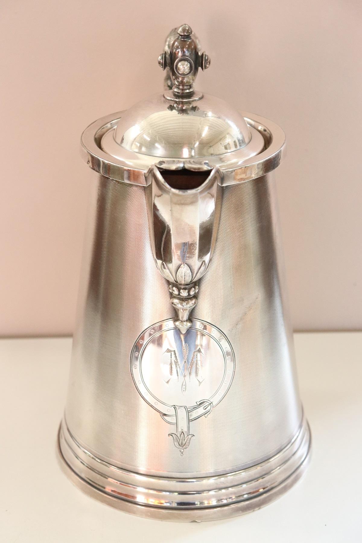 Beautiful American antique silver plate pitcher by Stimpson, 1868. Great chiseling work in the metal look carefully at the refined decoration. On the handle a woman's head. On front engraved two initials probably it was a gift for