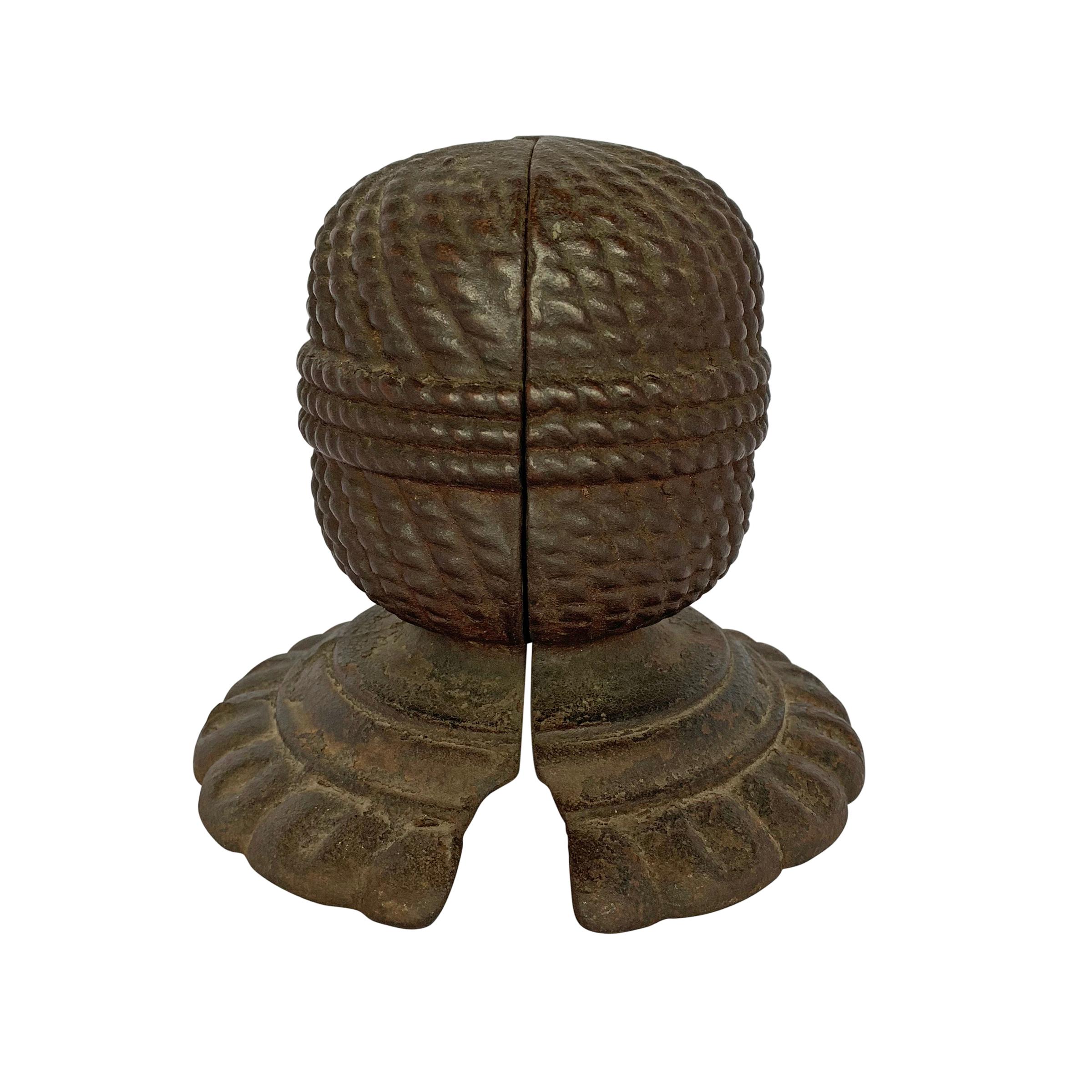 A whimsical 19th century American string holder in shape of a ball of string. The weight of the holder keeps it in place, but opens up when picked up. We have a similar one in our kitchen that we use to truss chickens, tie bundles of herbs for