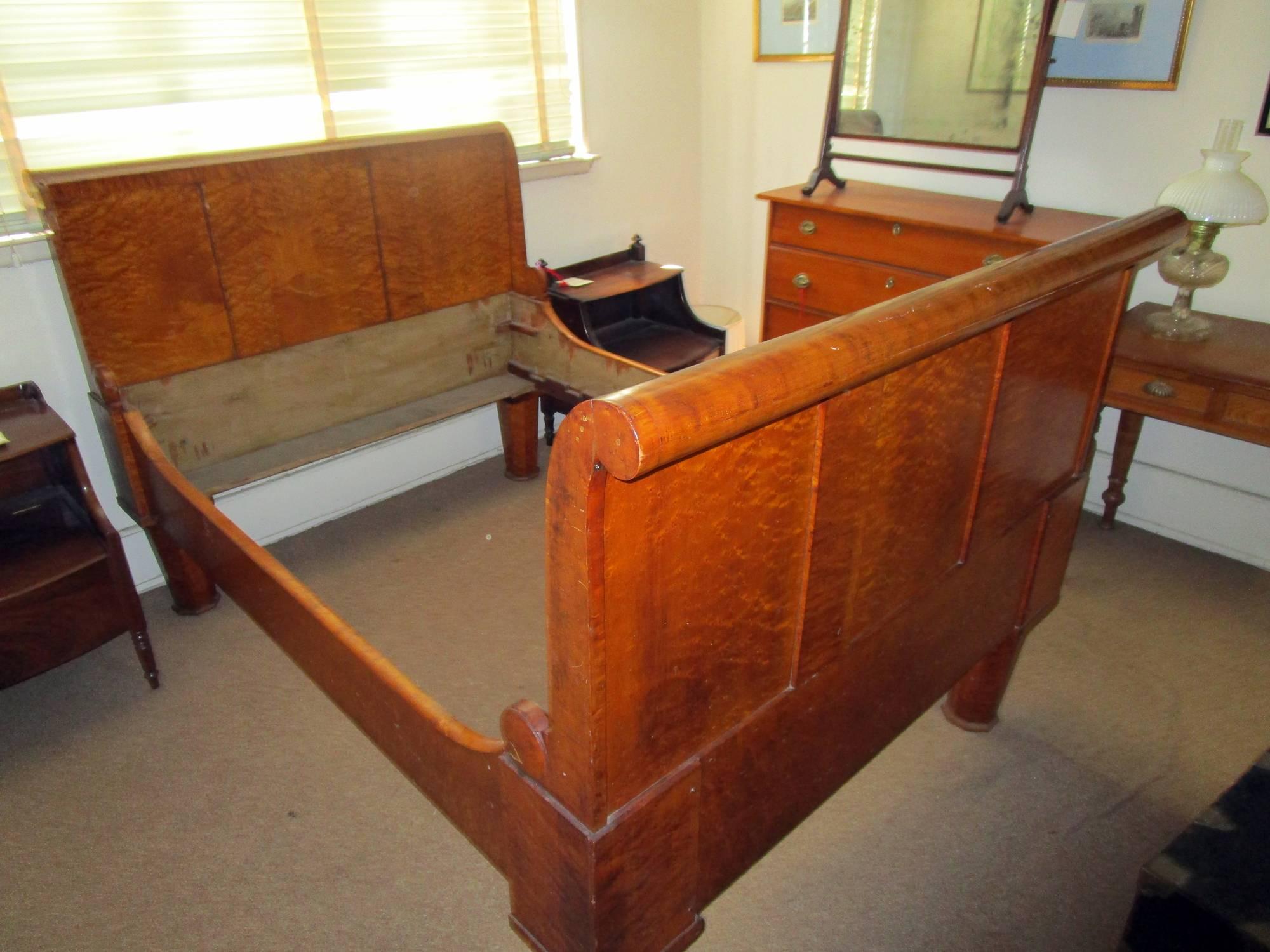 Classic American sleigh bed in a double size. Made of fine New England tiger and bird's-eye maple, it is solid, sturdy and would fit a mattress approximately 75 inches x 50 inches.See measurements other below.