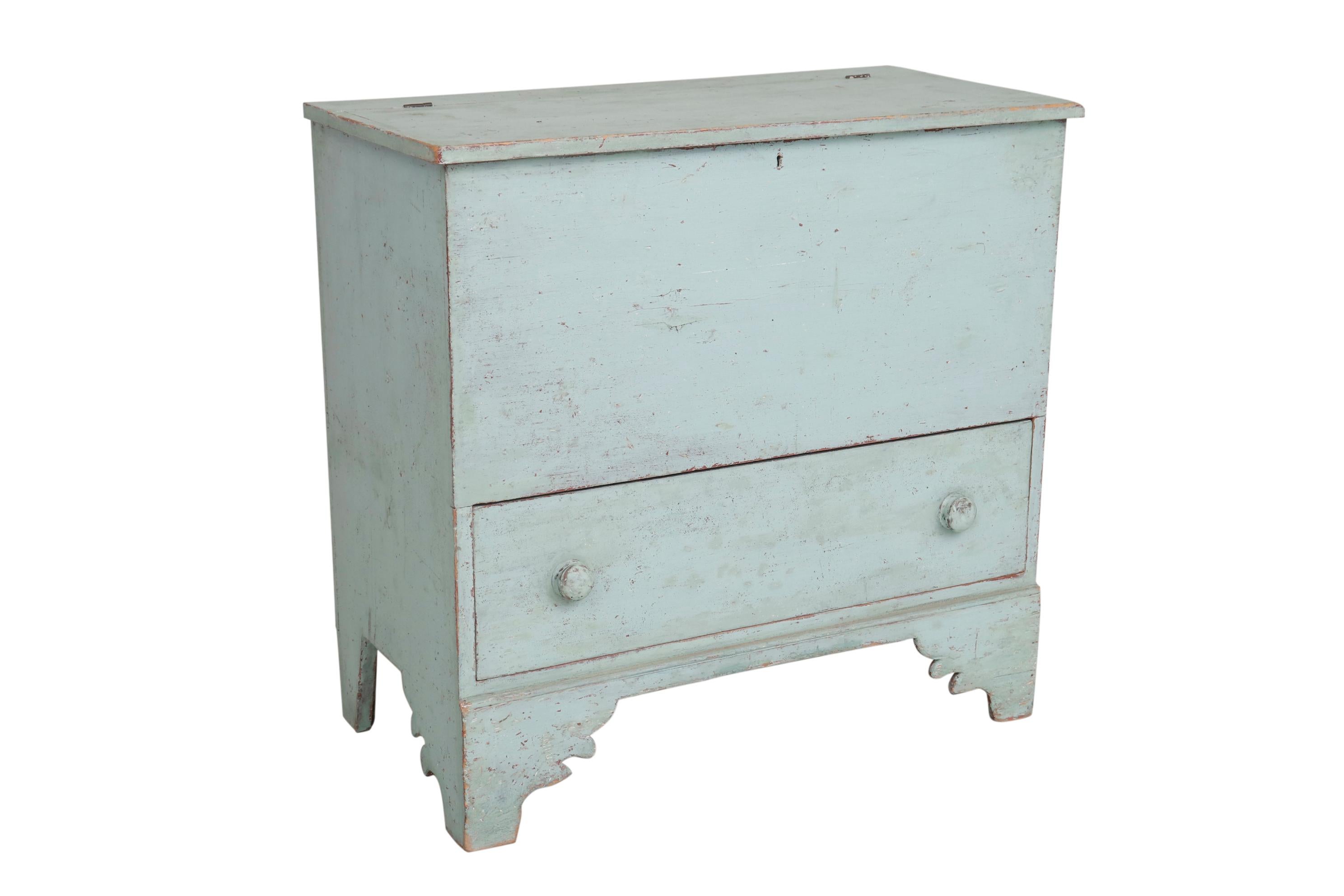 The blanket chest has its original paint and beautiful details in its 