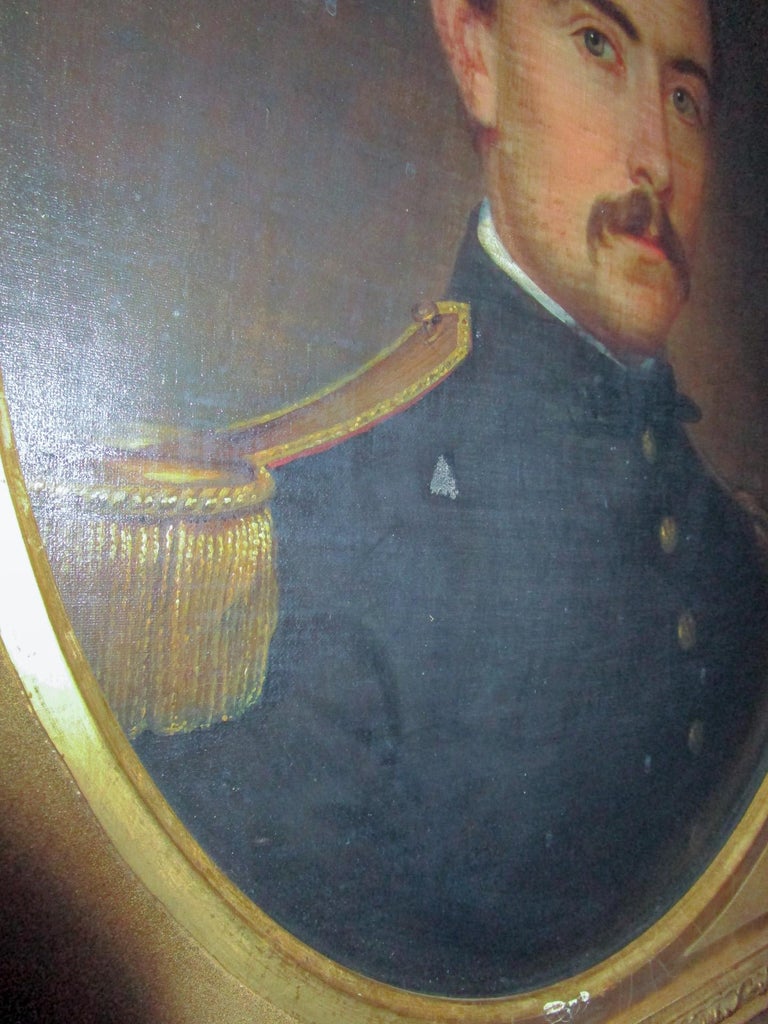 This stately Union Army officer portrait has been beautifully painted and framed with an oval period wooden frame. Unsigned. Unknown identity of soldier. Sight measurement: 16 inches wide x 20.25 inches tall.
