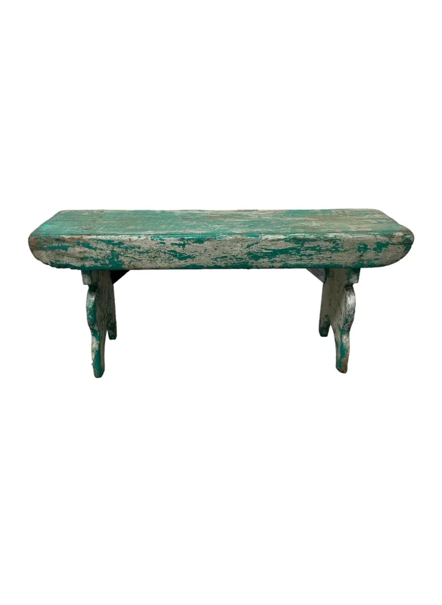 A wonderfully distressed antique early American Pennsylvania painted wooden bench with highly desirable heavily worn rustic patina.

Primitive hand-crafted solid wood construction, having a rectangular plank bench seat, quality mortise joinery,