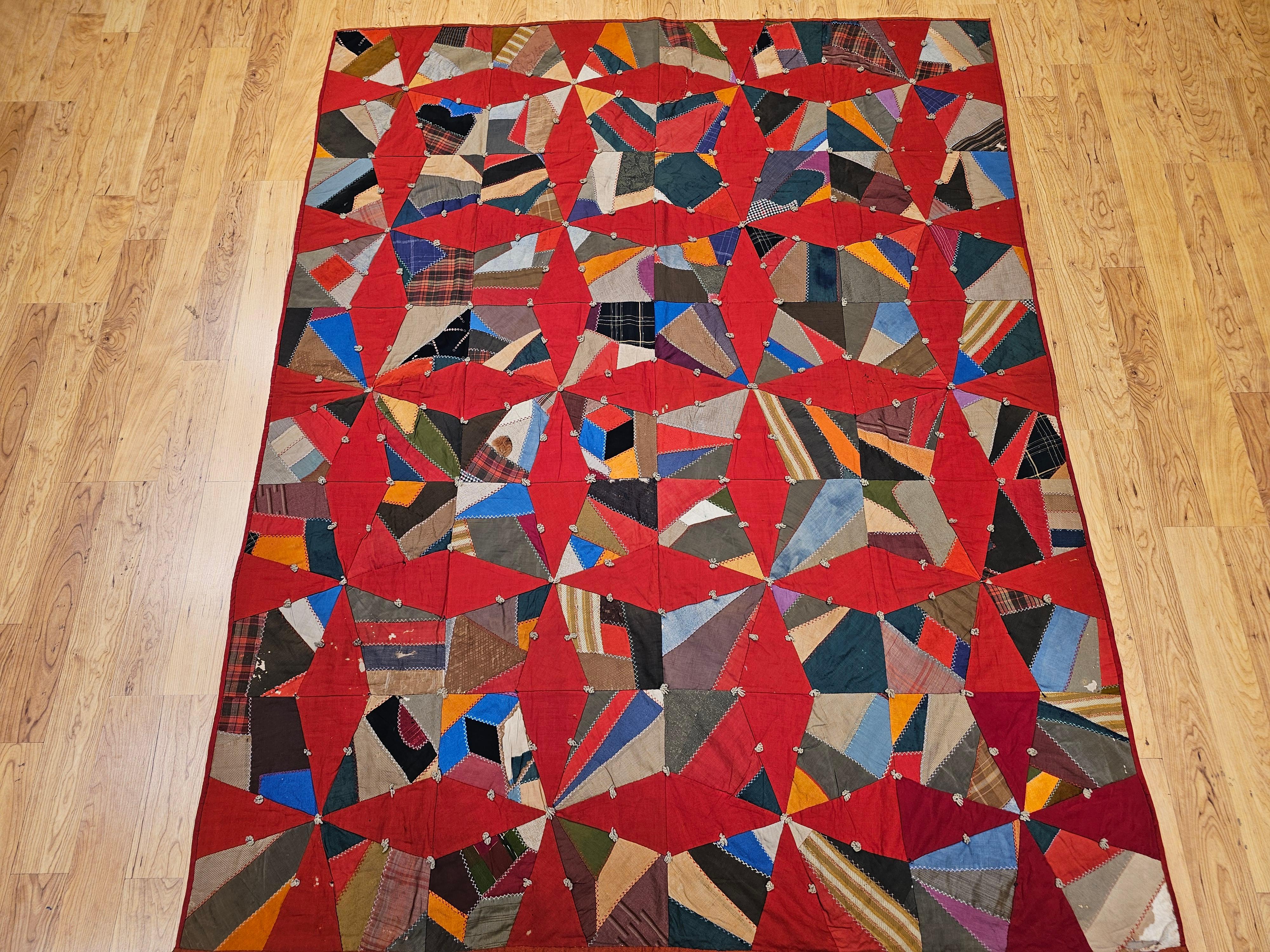 An exceptional late 19th-century American Crazy Quilt, hand-pieced, hand-stitched, and hand-tied with remarkable artistry and attention to detail. Likely originating from Pennsylvania and discovered in the New England region, this textile