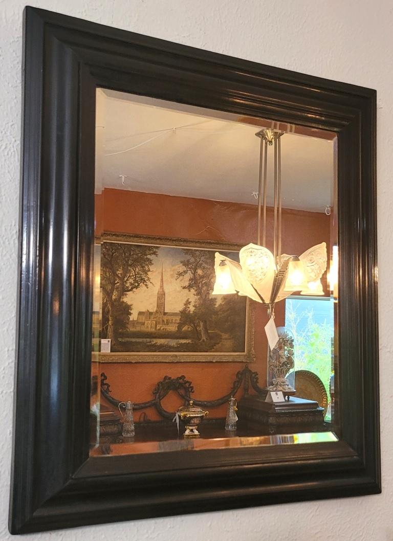 American Classical 19th Century American Ebony Mirror with Bevelled Glass For Sale