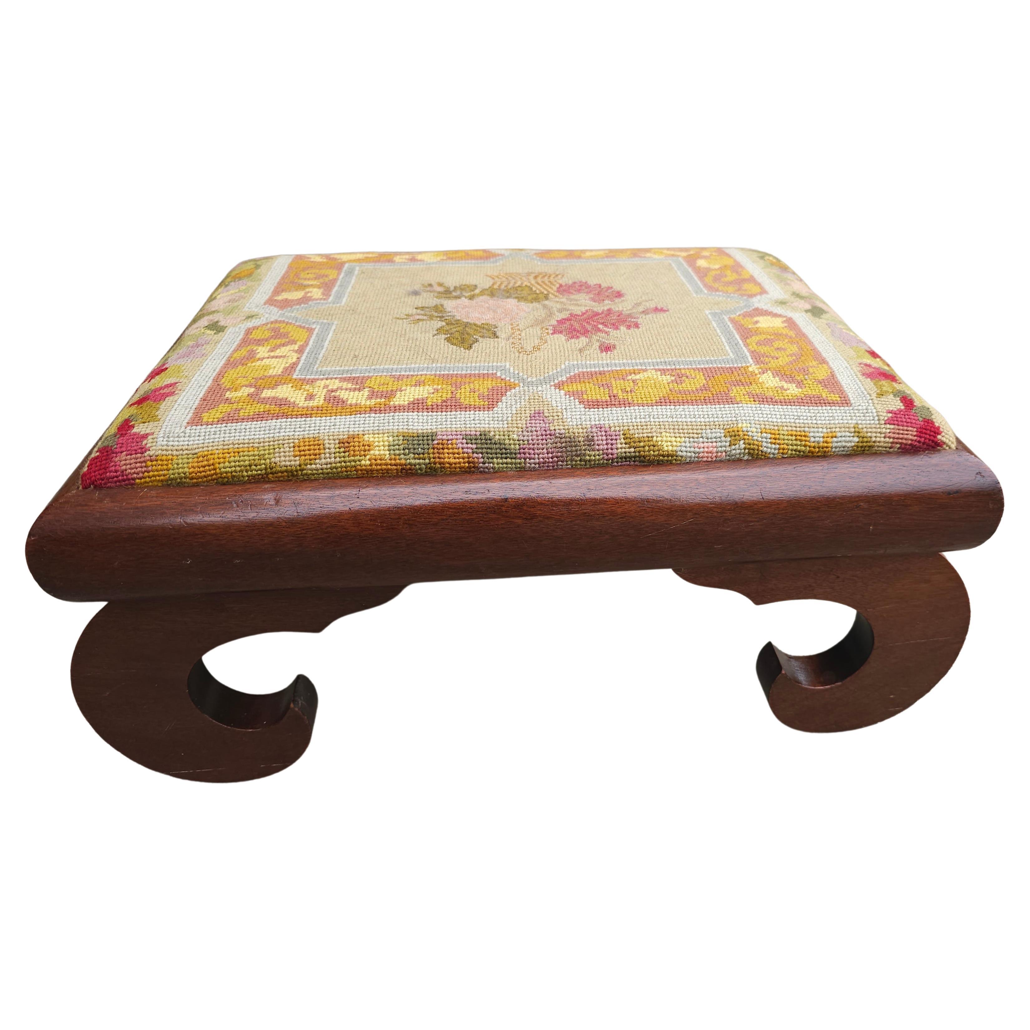 19th Century American Empire Magogany and Needlepoint Upholstered Foot Stool.
Measures 21.75