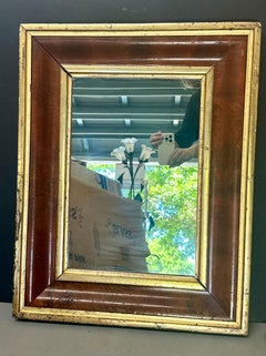 Espejo de pared conopial dorado y caoba del Imperio Americano del siglo XIX.