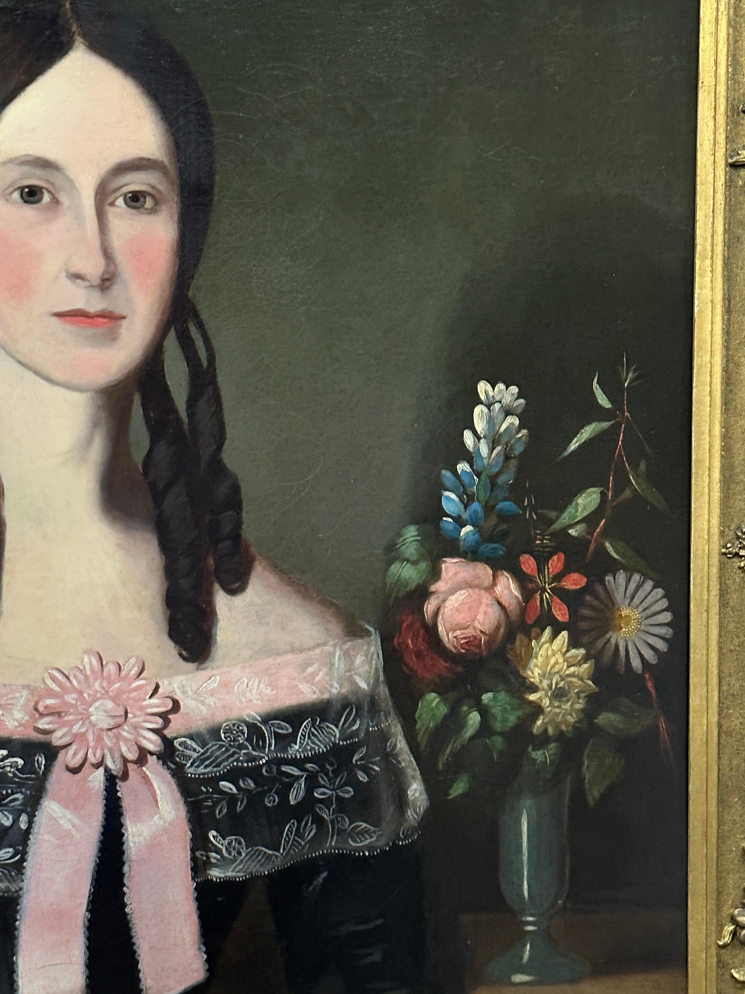 19th century American Folk Art portrait of a young lady holding a flower For Sale 2