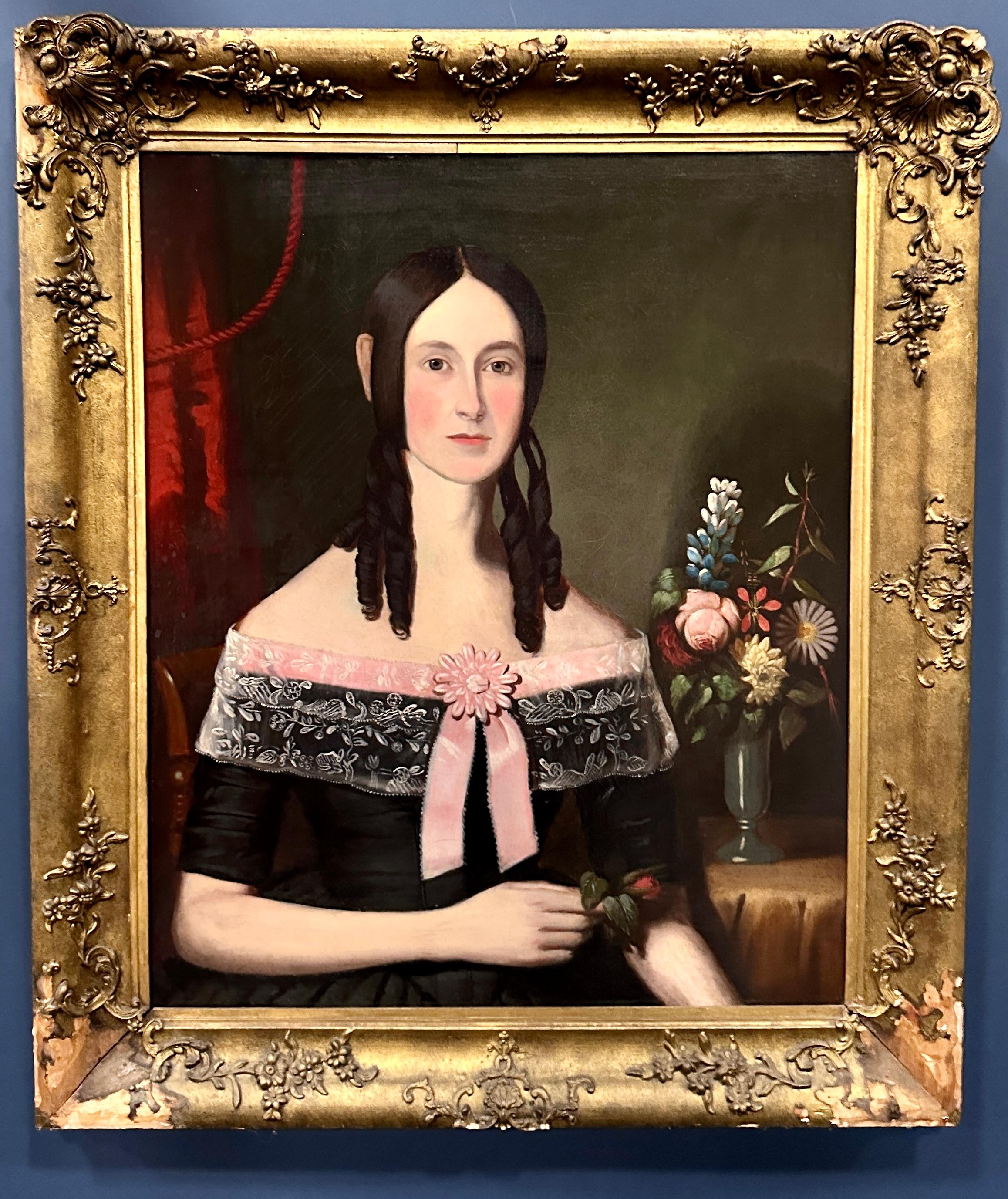 Very Interesting 19th century Folk art painting of a young woman. 

Classic American Folk art style portrait

Circa 1850-60

Oils on canvas

Original frame, with a little damage.

Possibly from the North East, Or New England

Previously from a