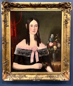 19th century American Folk Art portrait of a young lady holding a flower