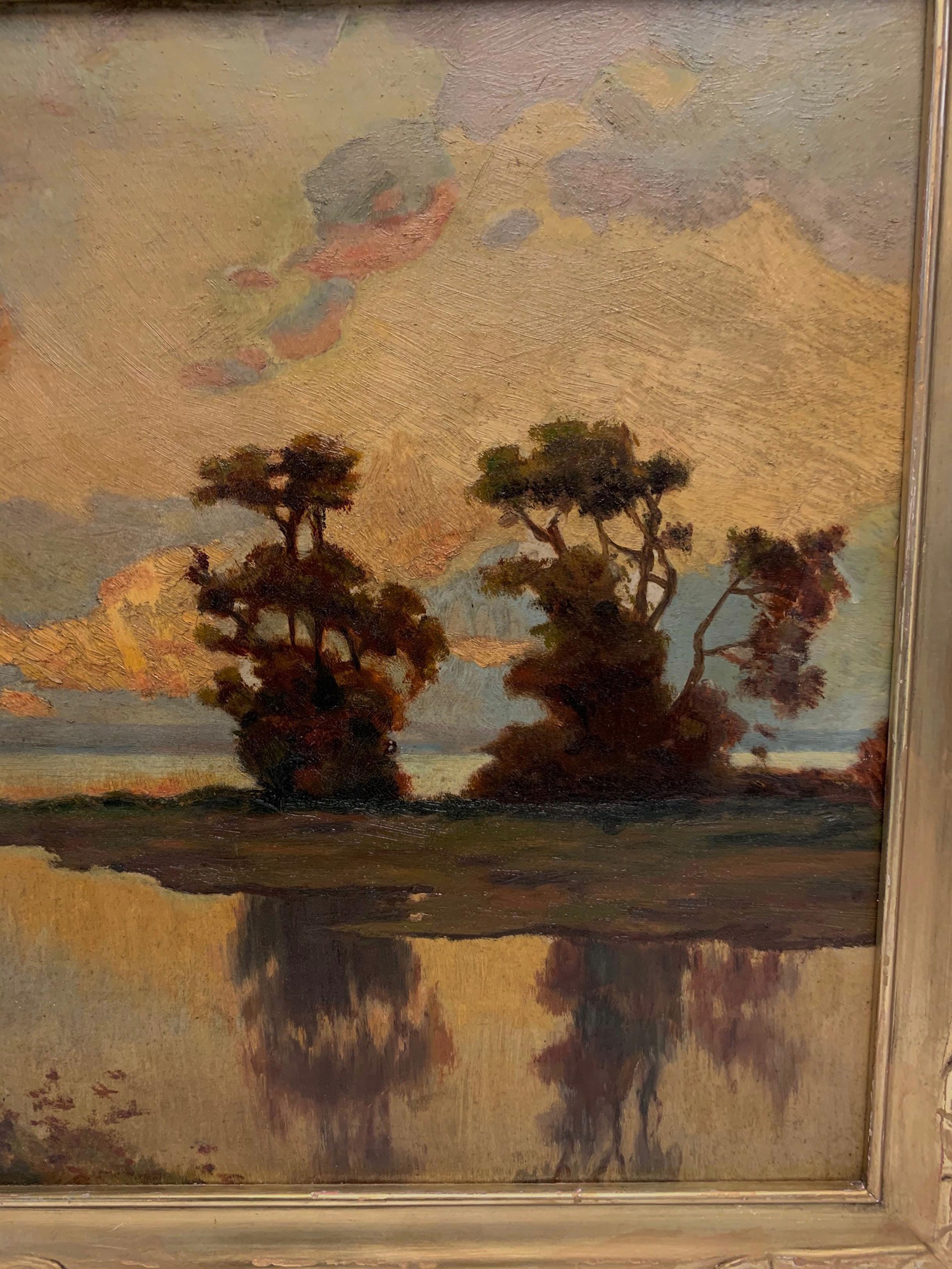 Late 19th century American impressionist oil on academy board, salt marshes near Essex, Mass. at sunset. Pencil signed on reverse, R. Lewis, in hand carved gilded frame.