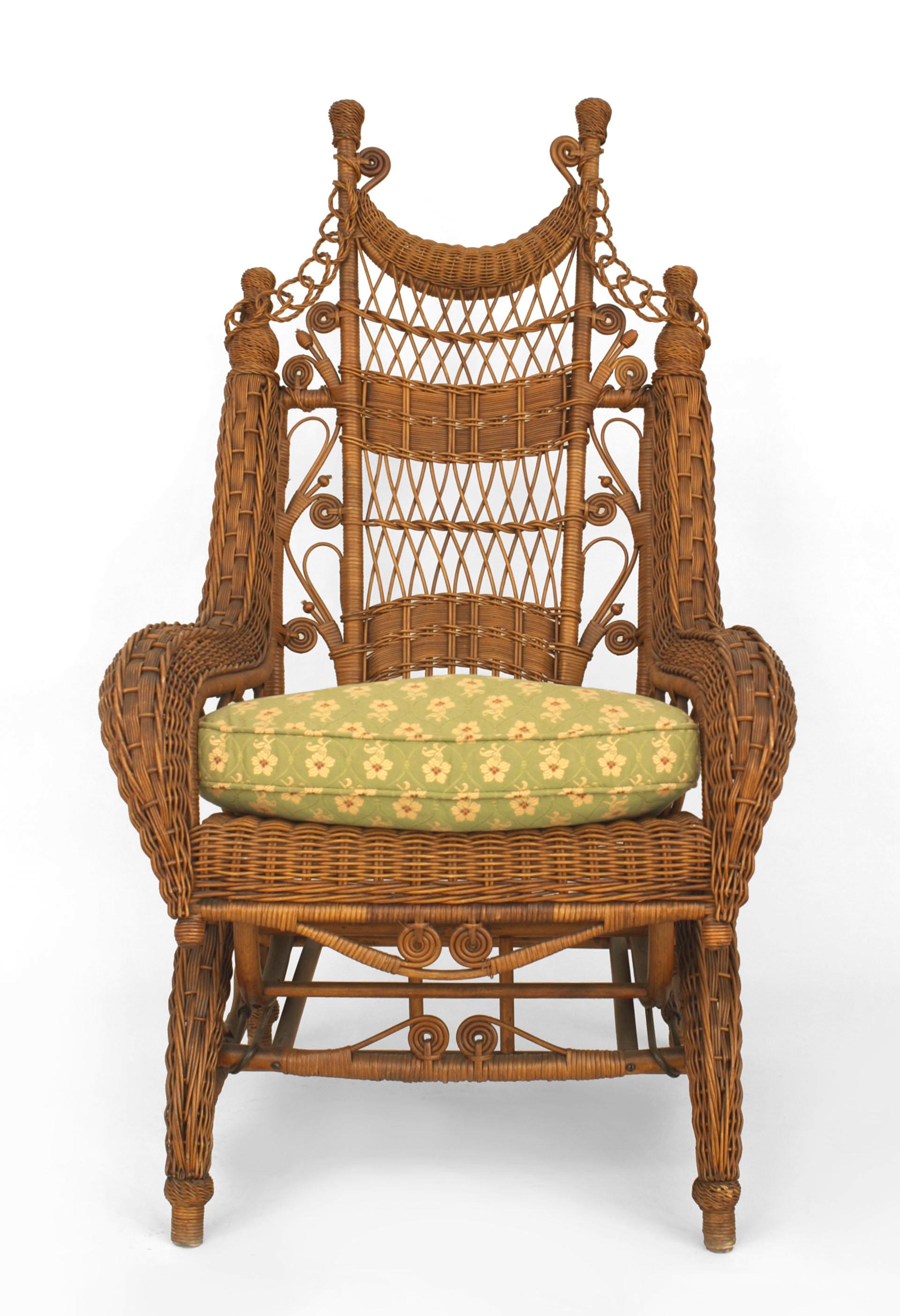 American Victorian natural wicker ornate high back platform rocking chair with woven rolled arms and finials & swag chain link on back (HEYWOOD BROS.)
